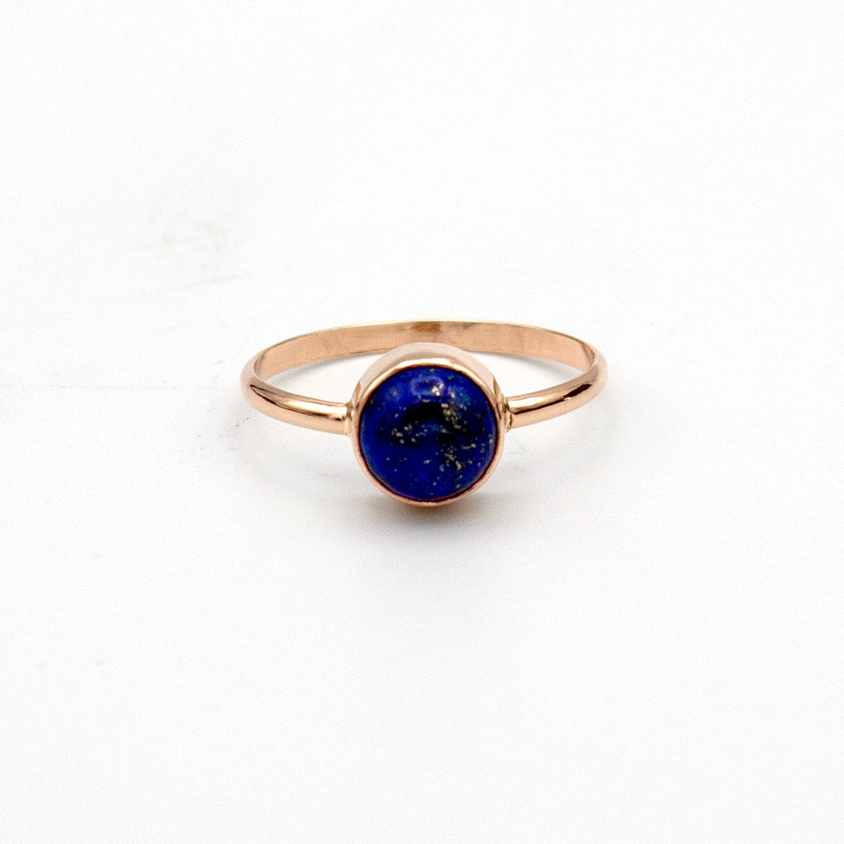 Lapis Lazuli Round Bezel Ring set in 14k gold filled metal, showcasing a deep blue gemstone in a stylish open bezel setting.