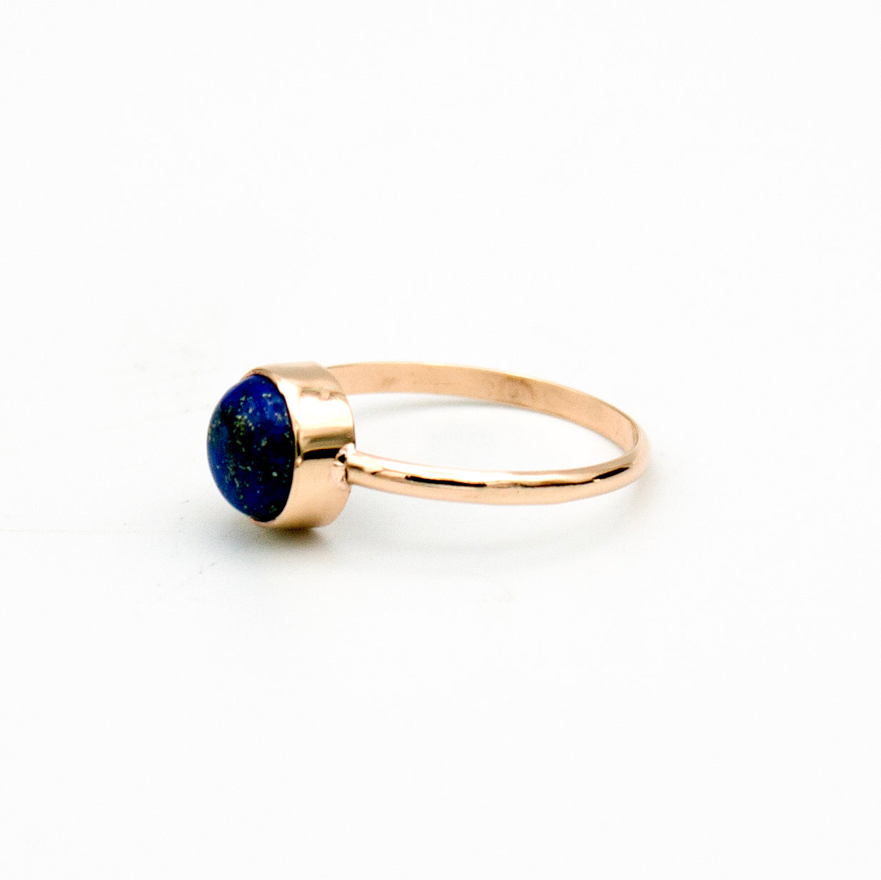 Lapis Lazuli Round Bezel Ring set in 14k gold filled metal, showcasing a deep blue gemstone in a stylish open bezel setting.