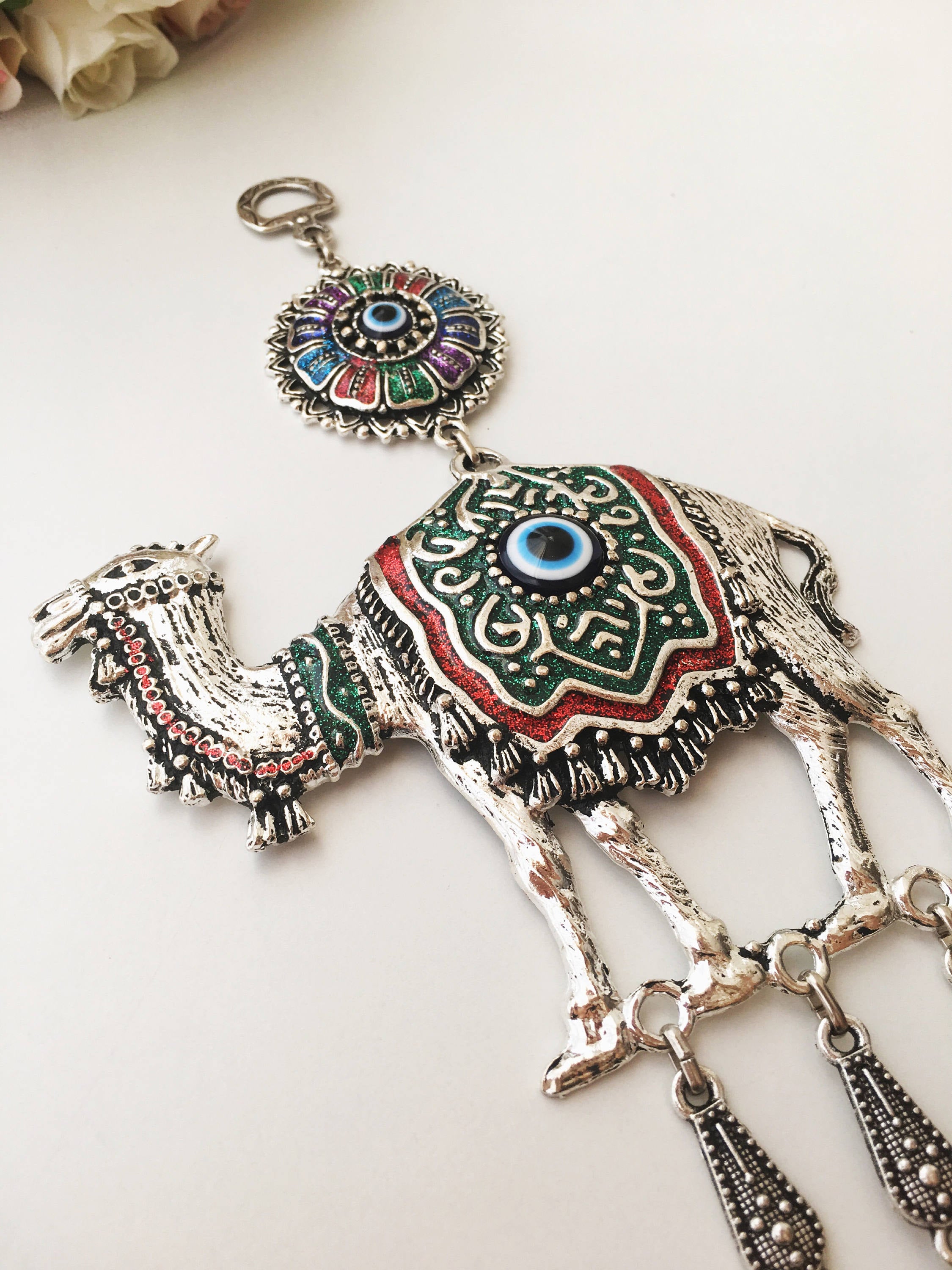 Large Camel Evil Eye Wall Hanging featuring unique handmade design with large evil eye beads and metal camel charm.
