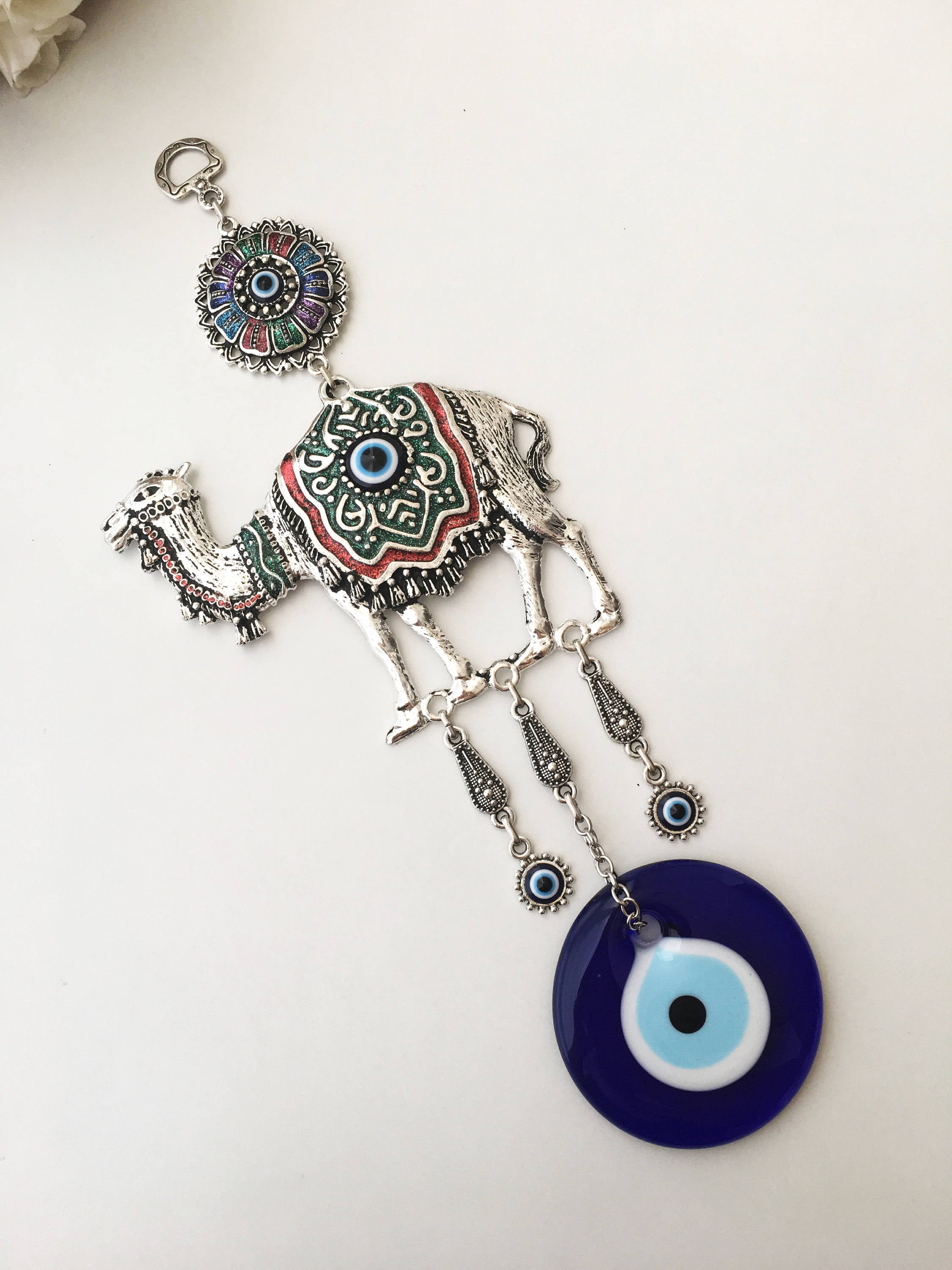 Large Camel Evil Eye Wall Hanging featuring unique handmade design with large evil eye beads and metal camel charm.