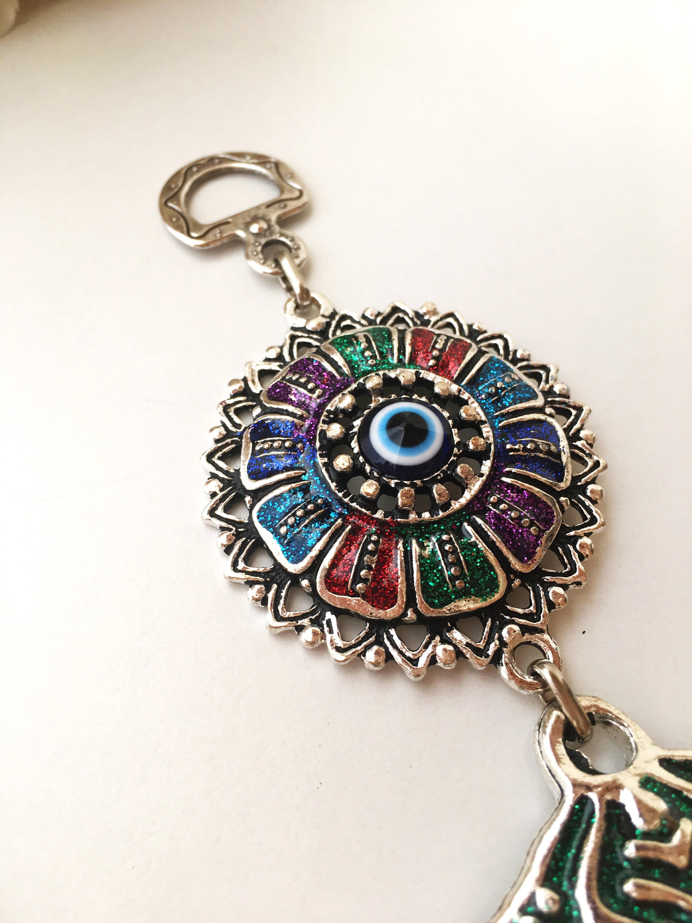 Large Camel Evil Eye Wall Hanging featuring unique handmade design with large evil eye beads and metal camel charm.