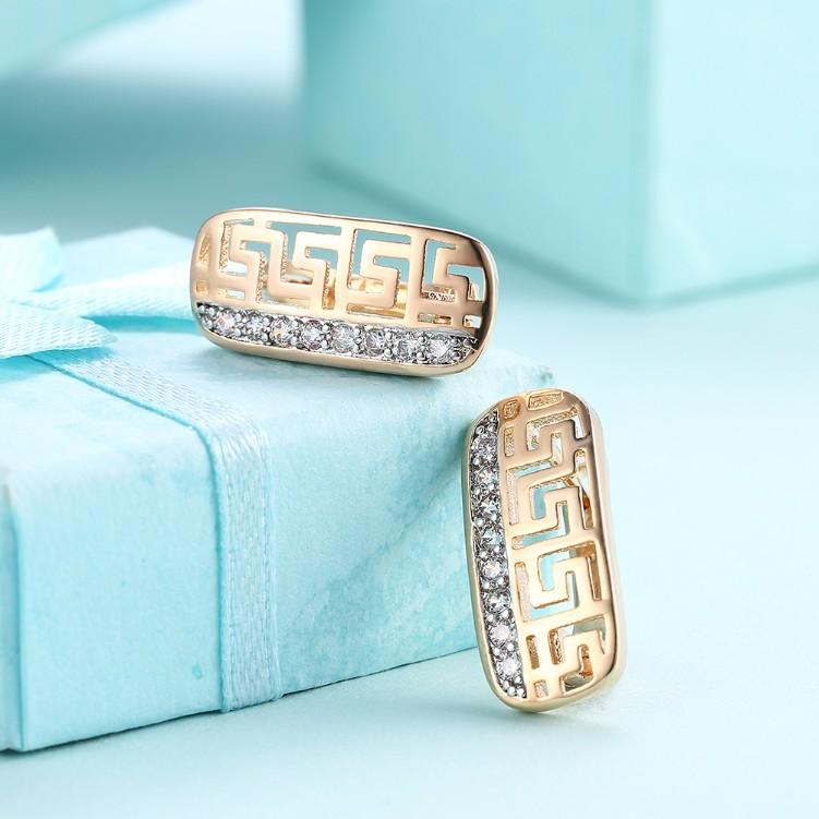 A pair of elegant Laser Cut Austrian Crystal Micro-Pav'e Lined Huggie Hoop Earrings Set, showcasing their intricate design and sparkling crystals.