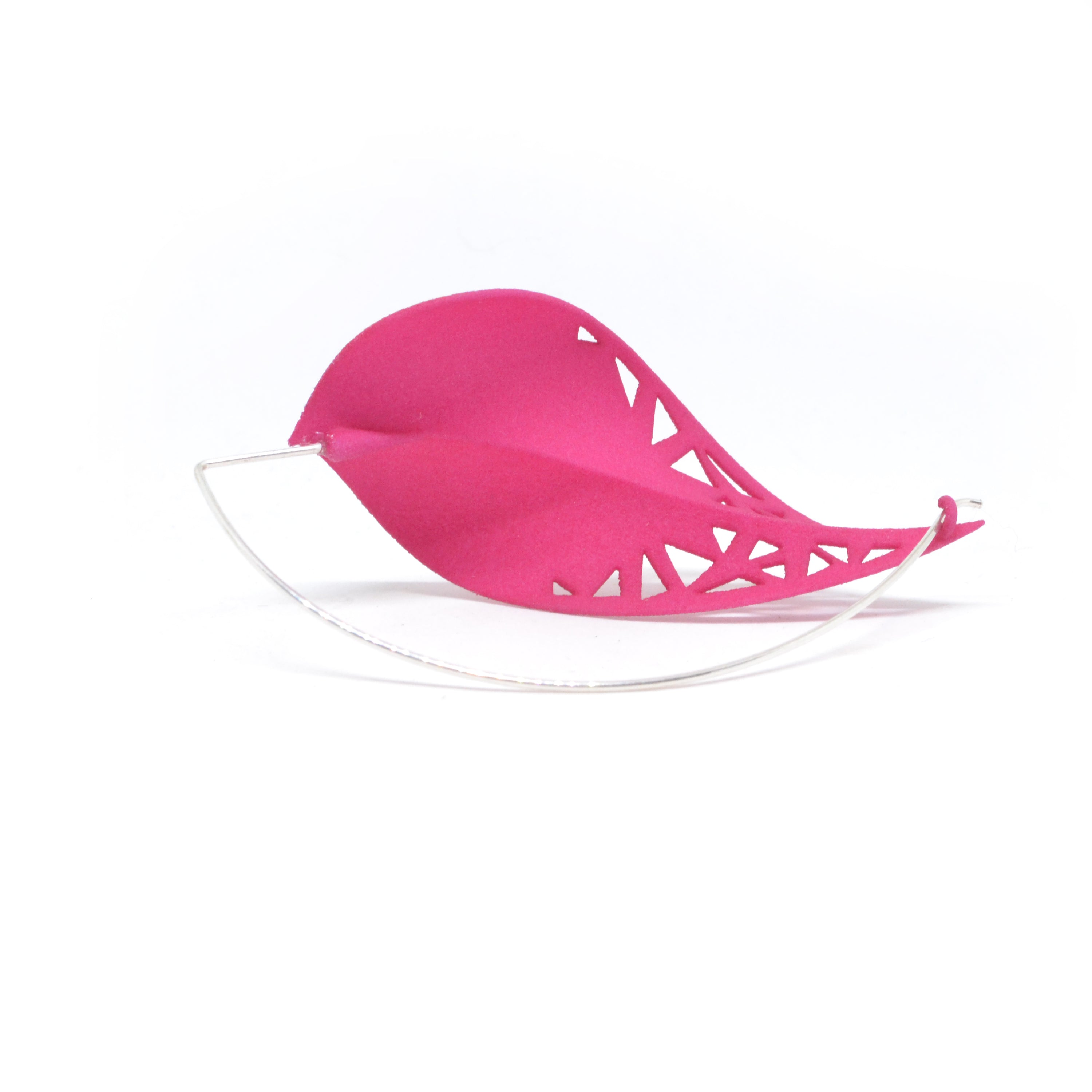 Oversize Leaf Earrings in vibrant colors inspired by rainforest flora, featuring a lightweight design and hypoallergenic materials.