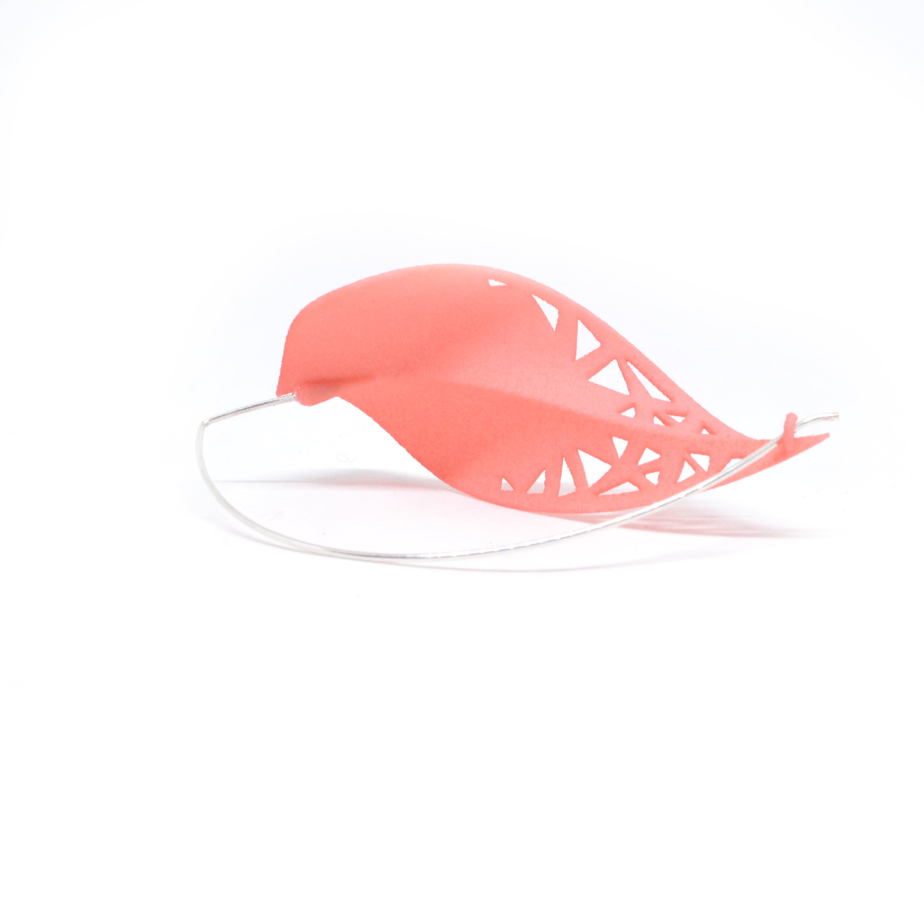 Oversize Leaf Earrings in vibrant colors inspired by rainforest flora, featuring a lightweight design and hypoallergenic materials.