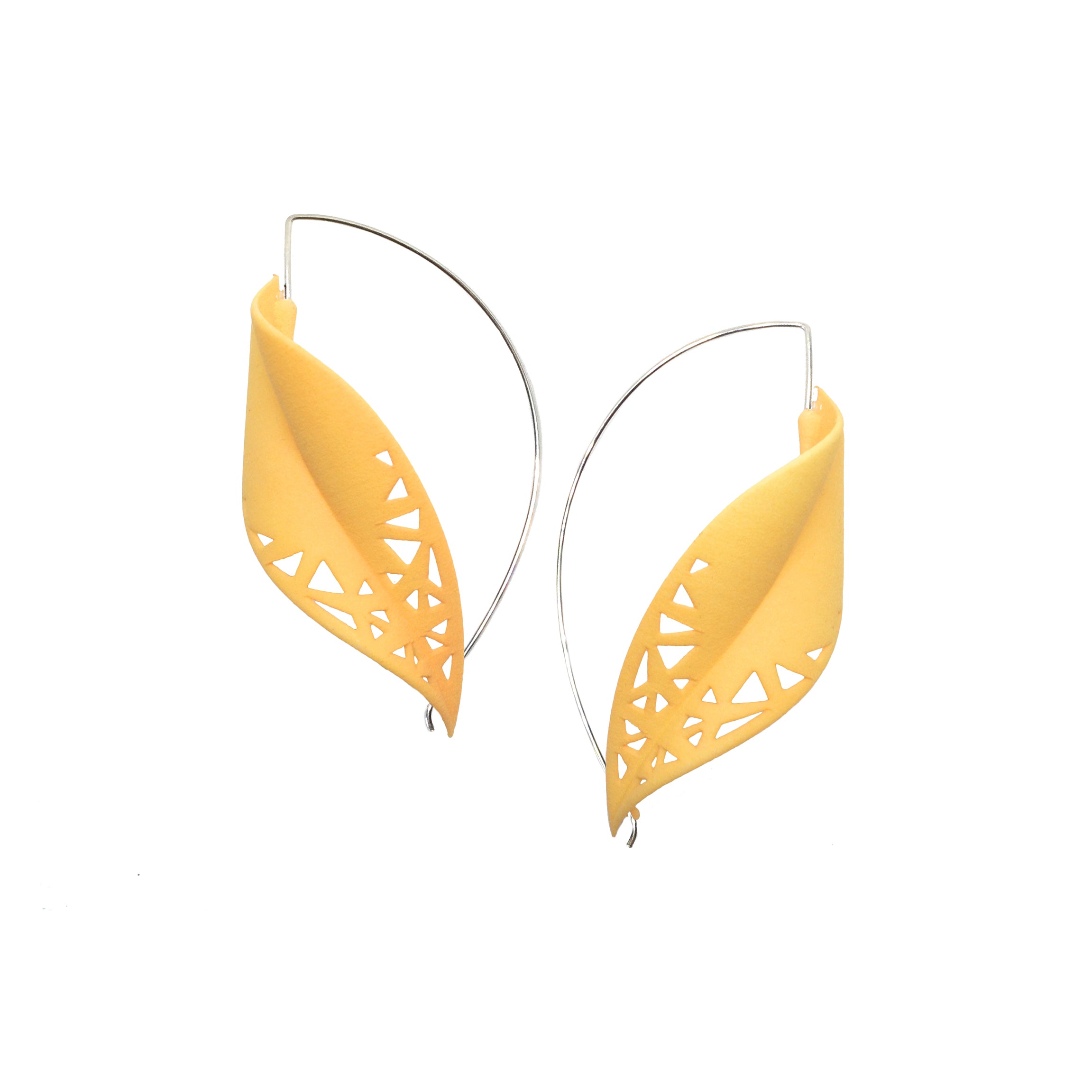 Oversize Leaf Earrings in vibrant colors inspired by rainforest flora, featuring a lightweight design and hypoallergenic materials.