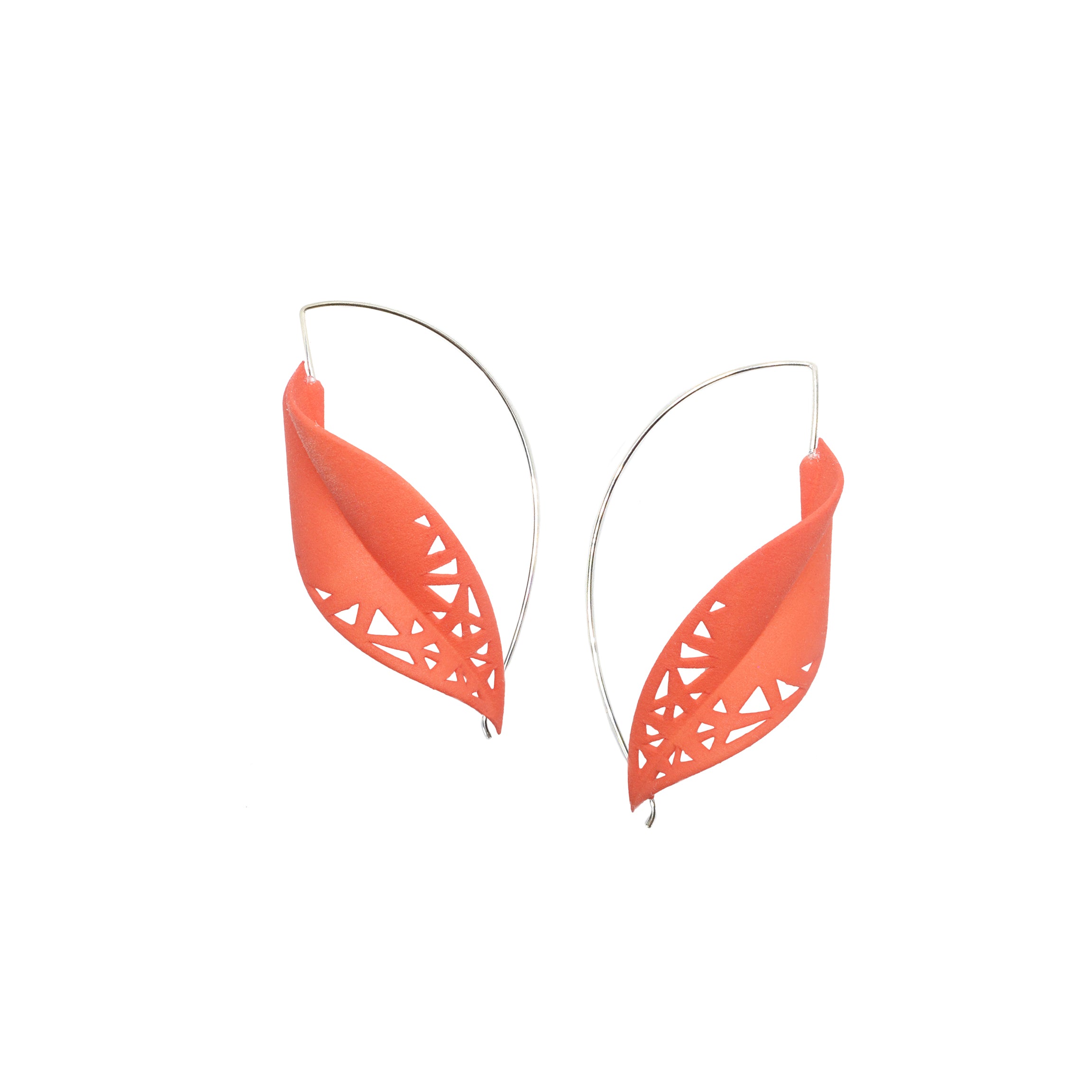 Oversize Leaf Earrings in vibrant colors inspired by rainforest flora, featuring a lightweight design and hypoallergenic materials.