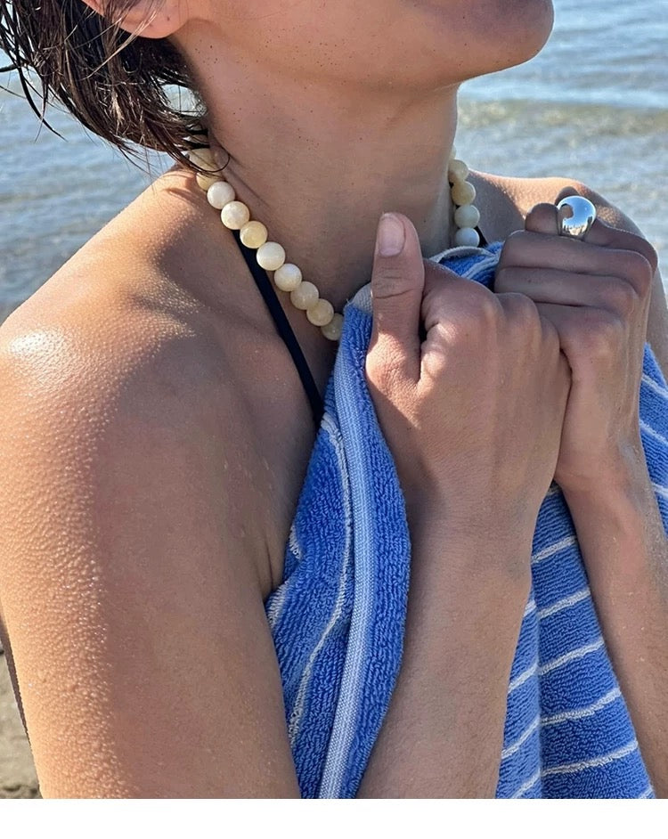 A vibrant Lemon Drop Delight Yellow Jade Necklace featuring naturally formed yellow jade stones resembling lemon candies, perfect for summer styling.