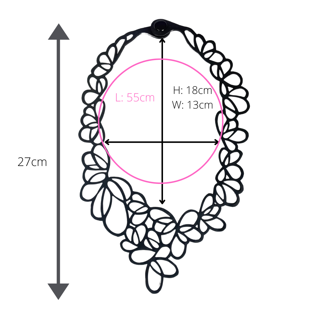 Lilac Statement Inner Tube Necklace handcrafted from reclaimed rubber, featuring an off-centre design and lightweight cord.