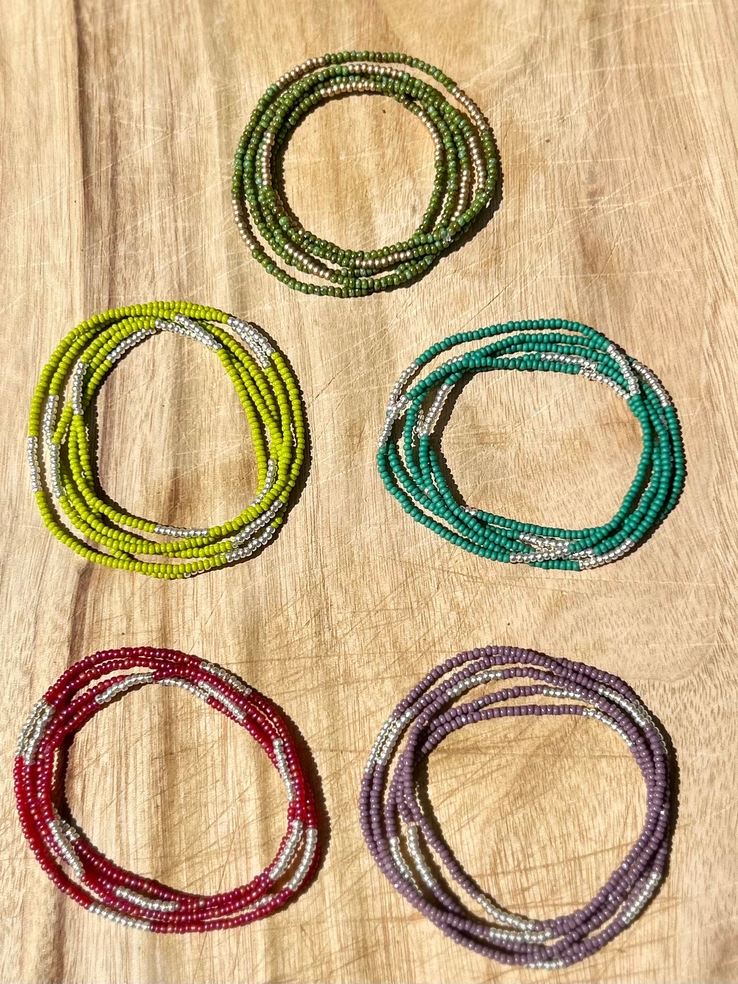 Lime green beaded 5-wrap bracelet with silver stripes, showcasing vibrant Czech glass beads and strong elastic cording.