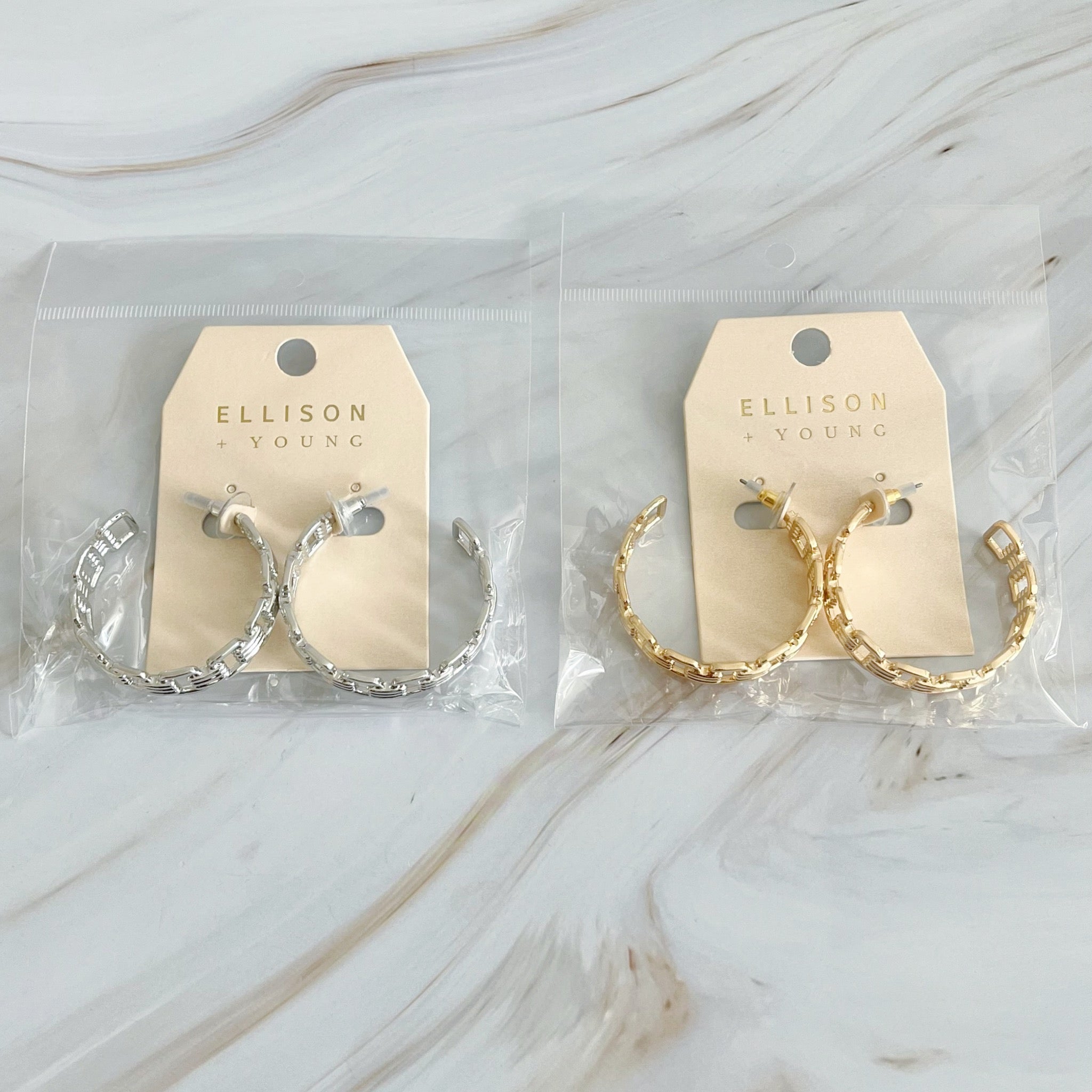 Elegant Linked Golden Hoop Earrings with a modern design, showcasing a unique linked pattern and a beautiful golden finish.