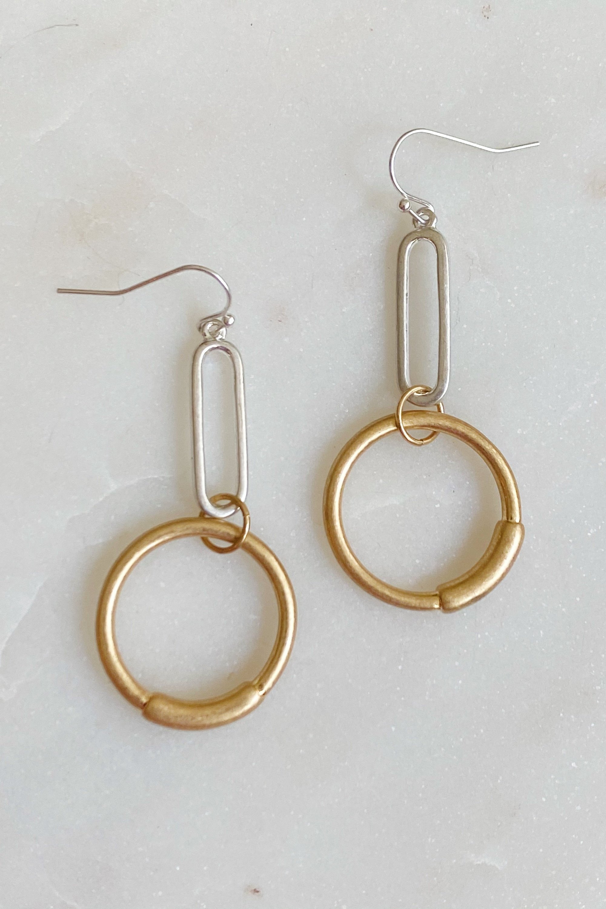 Linked Shapes Earrings featuring a classy gold and silver design, measuring 1 inch by 2.5 inches.