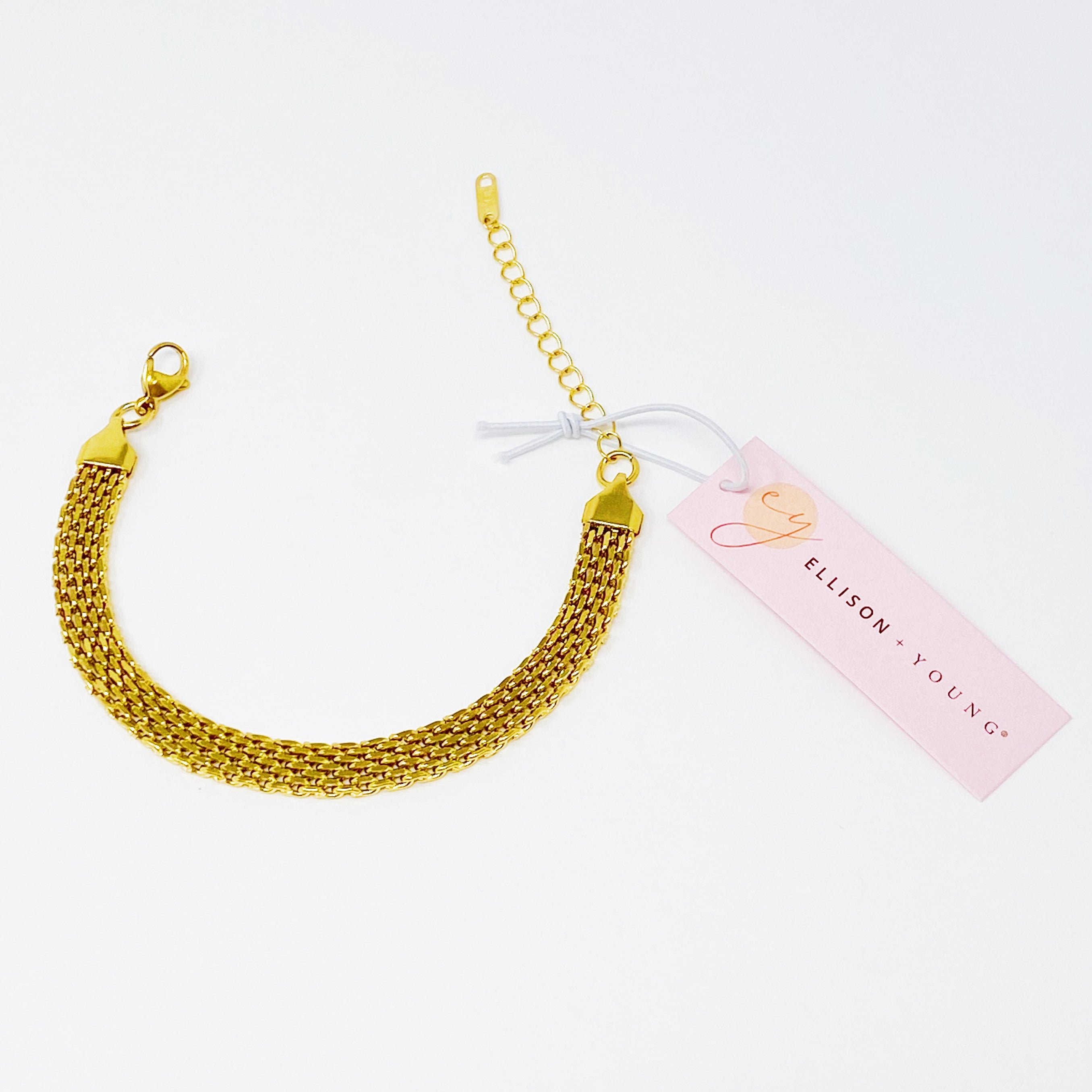 A stylish Links All Around Bracelet featuring a mesh gold design, adjustable length, and high-quality stainless steel construction.