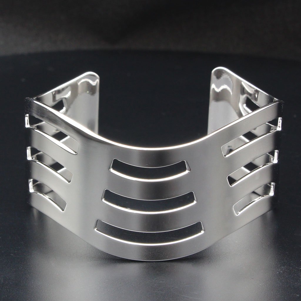 High polished stainless steel bangle with a sleek design, showcasing its shiny surface and lightweight structure.