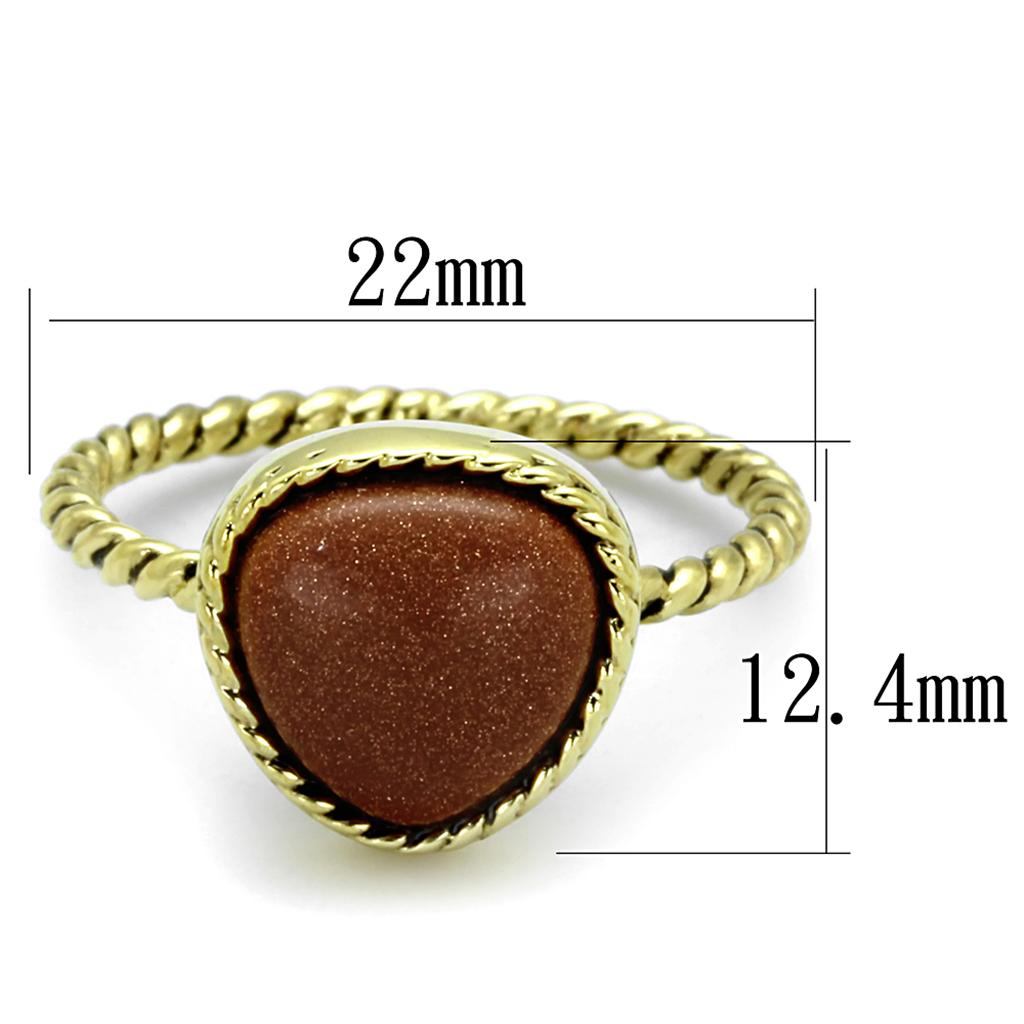 A beautiful gold brass ring featuring a brown synthetic cat eye stone, showcasing elegance and craftsmanship.