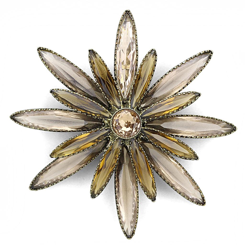 Antique copper brass brooch featuring champagne synthetic glass stone, elegantly designed for versatile styling.