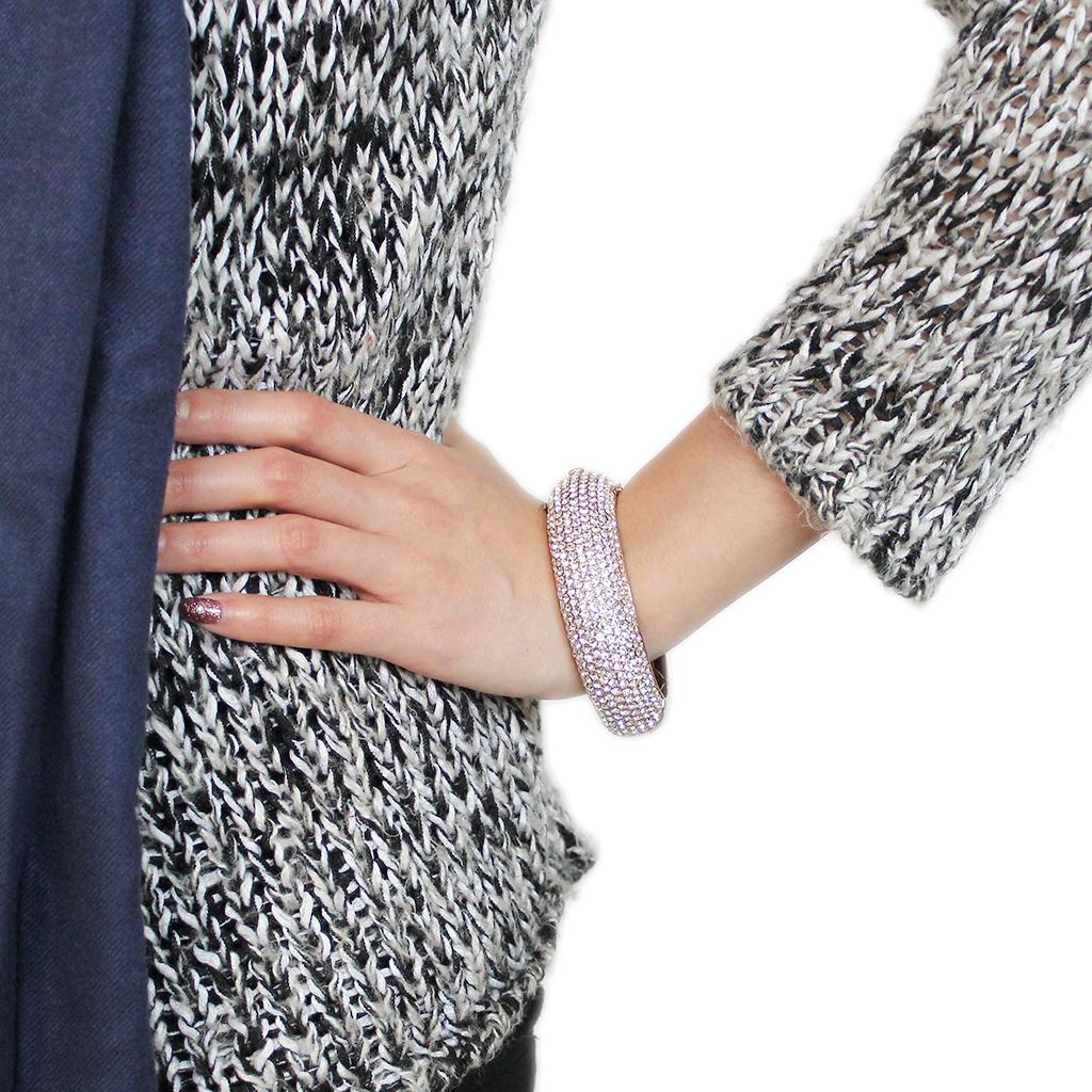 Rose Gold brass bangle featuring a clear top grade crystal, elegantly designed for stylish wear.