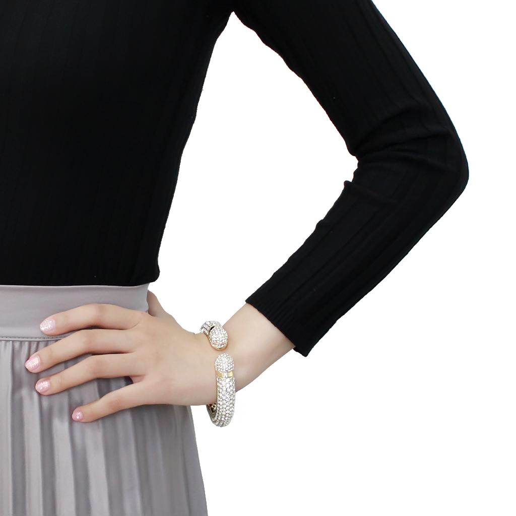 LO4311 Flash Gold Brass Bangle featuring a clear top-grade crystal, showcasing its elegant design and luxurious finish.