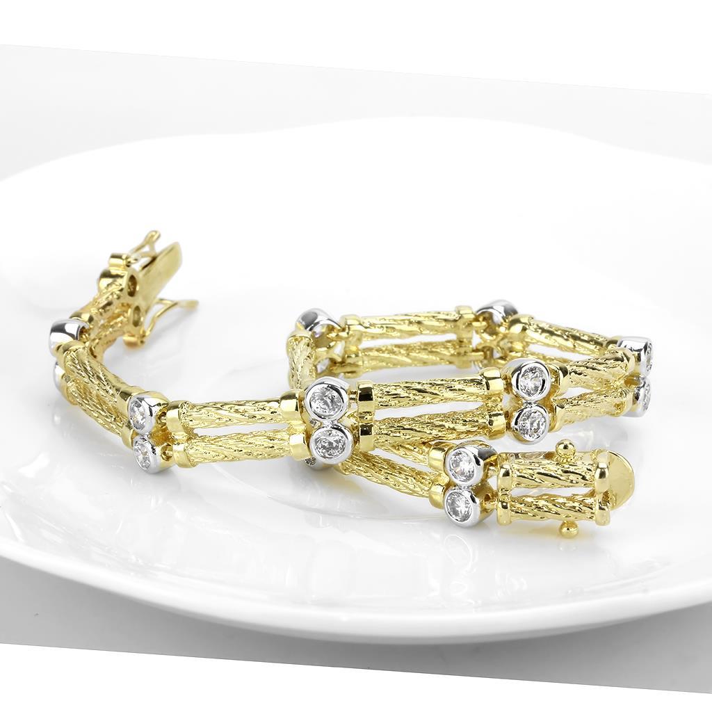 Gold and rhodium brass bracelet featuring a clear AAA grade cubic zirconia stone, elegantly designed for any occasion.