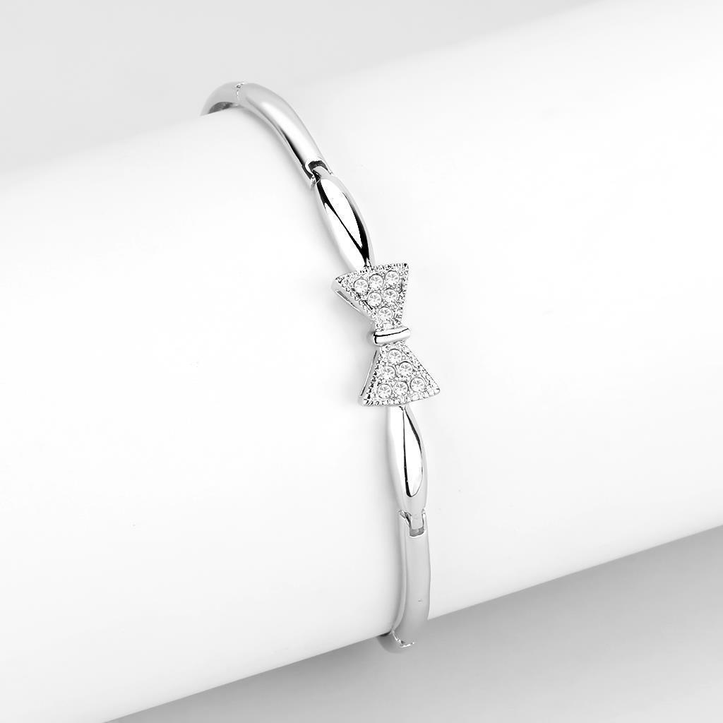 Rhodium brass bracelet featuring a clear top grade crystal centerpiece, showcasing elegance and sophistication.
