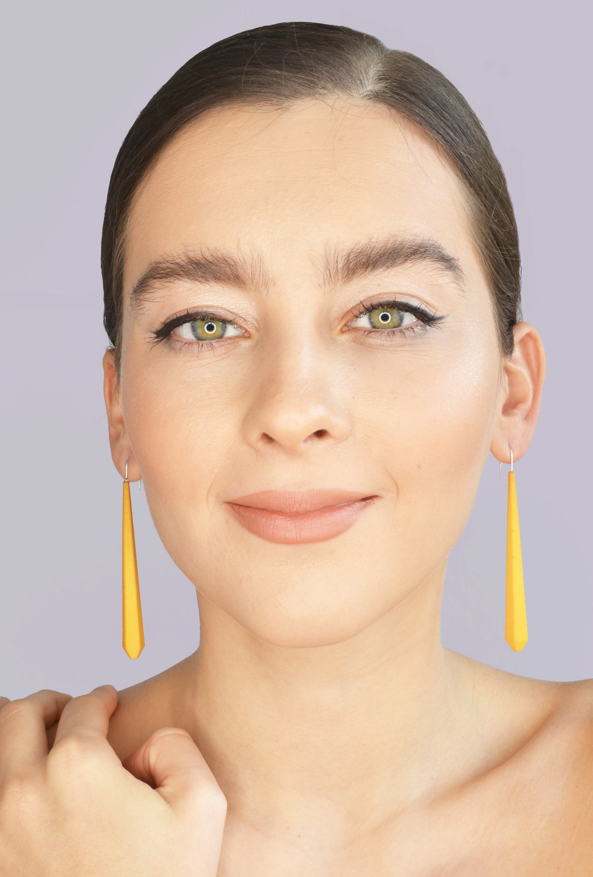 Long Pentagon Earrings XL in vibrant colors with sterling silver hooks, showcasing a modern geometric design.