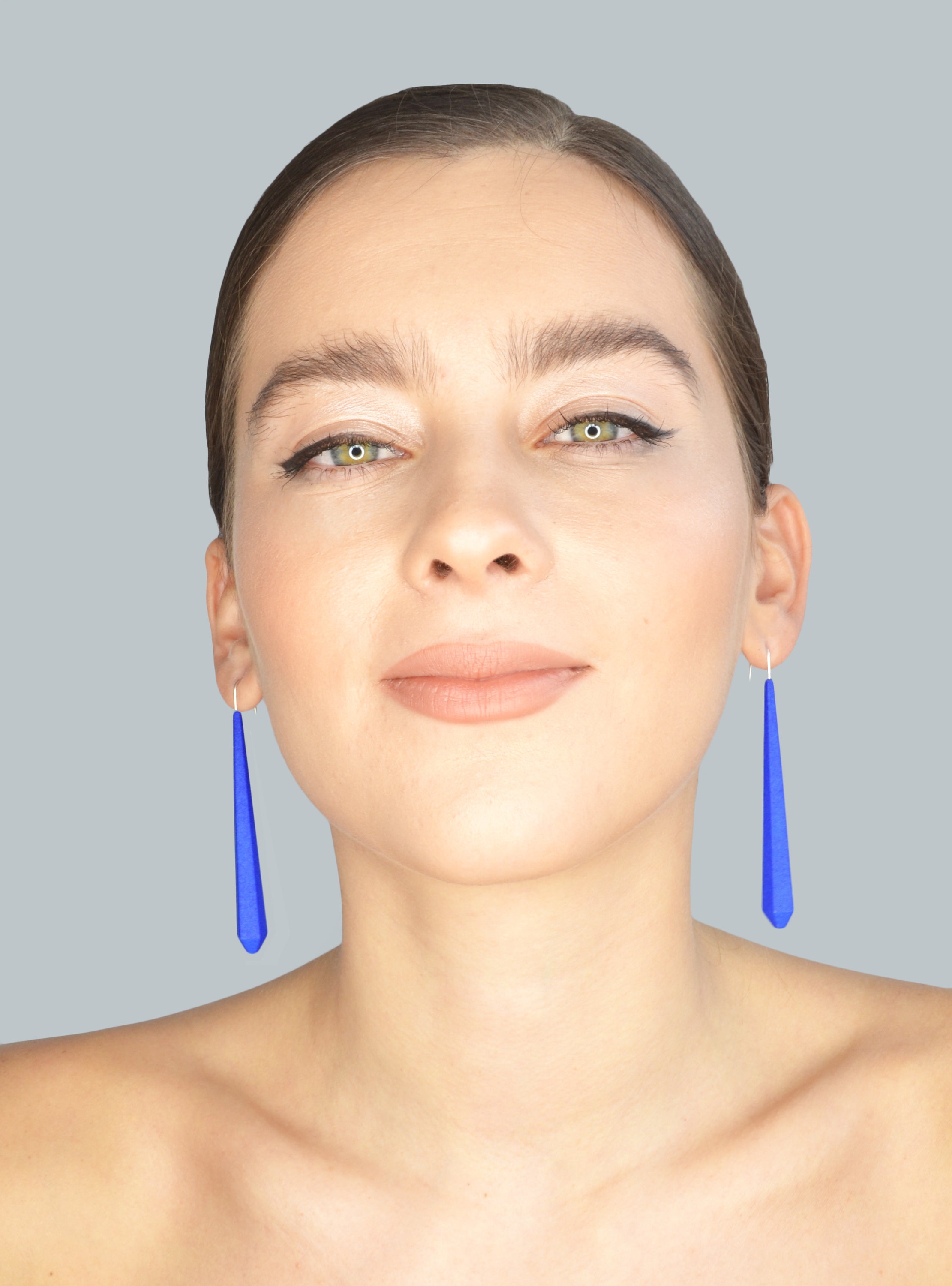 Long Pentagon Earrings XL in vibrant colors with sterling silver hooks, showcasing a modern geometric design.