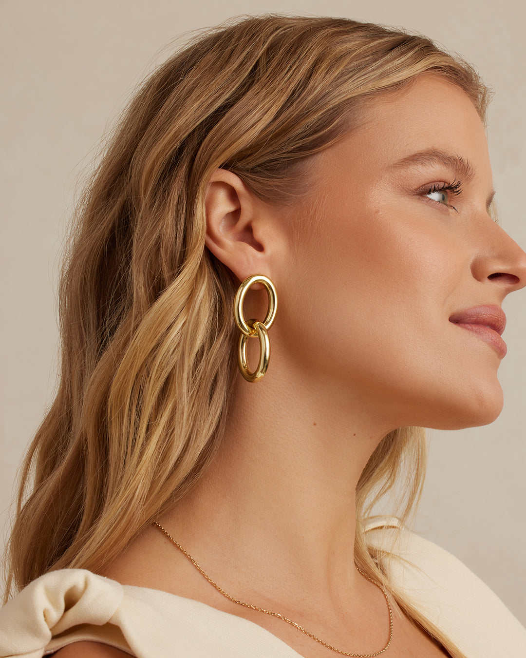Elegant Lou Drop Earrings featuring a unique drop design, crafted from high-quality materials for a sophisticated look.