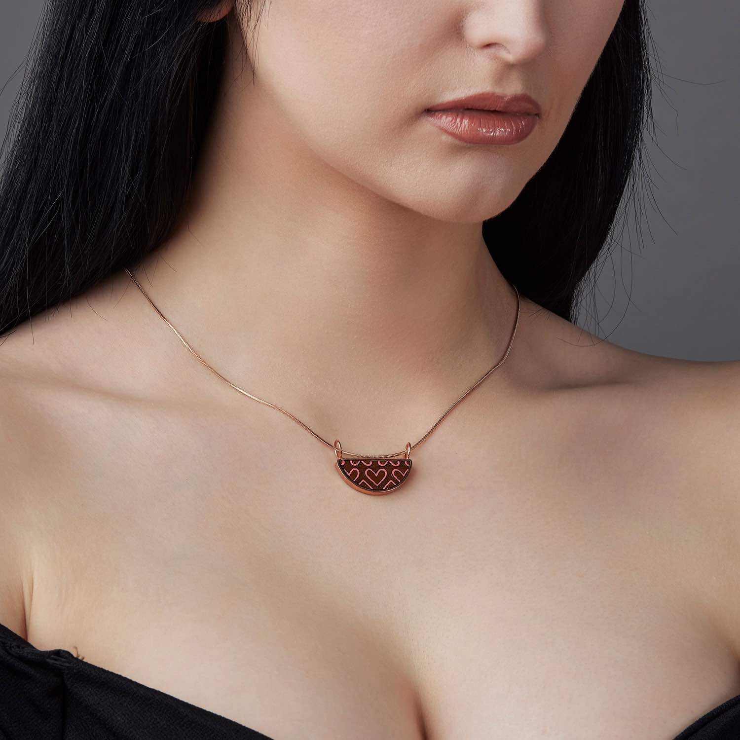 Handmade Love Recycled Wood Rose Gold Necklace featuring a unique wooden pendant and rose gold plated chain, elegantly displayed in a luxury gift box.