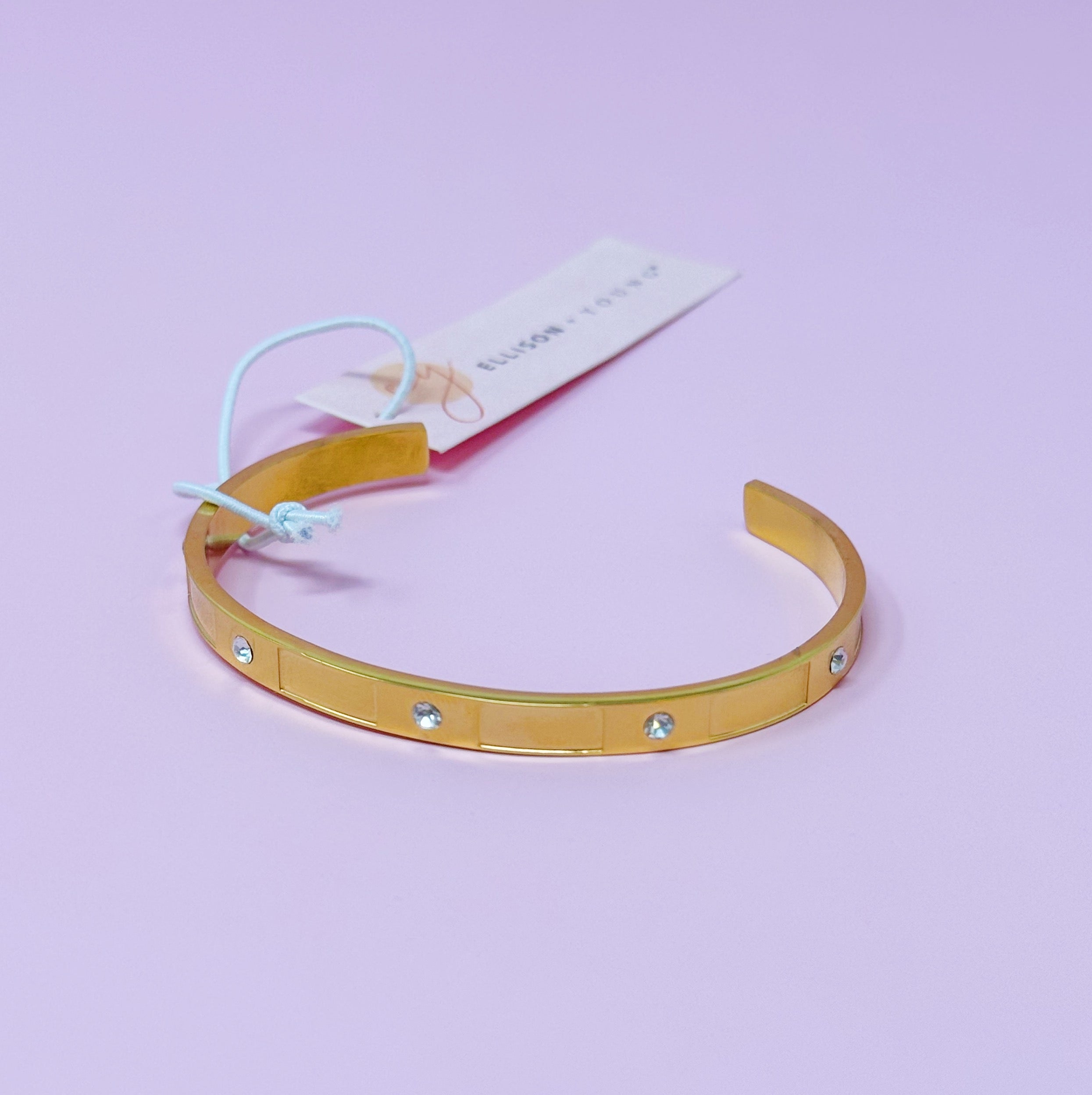 Lovely Open Bangle featuring intricate detailing and a modern open design, crafted from 18k gold plated stainless steel.