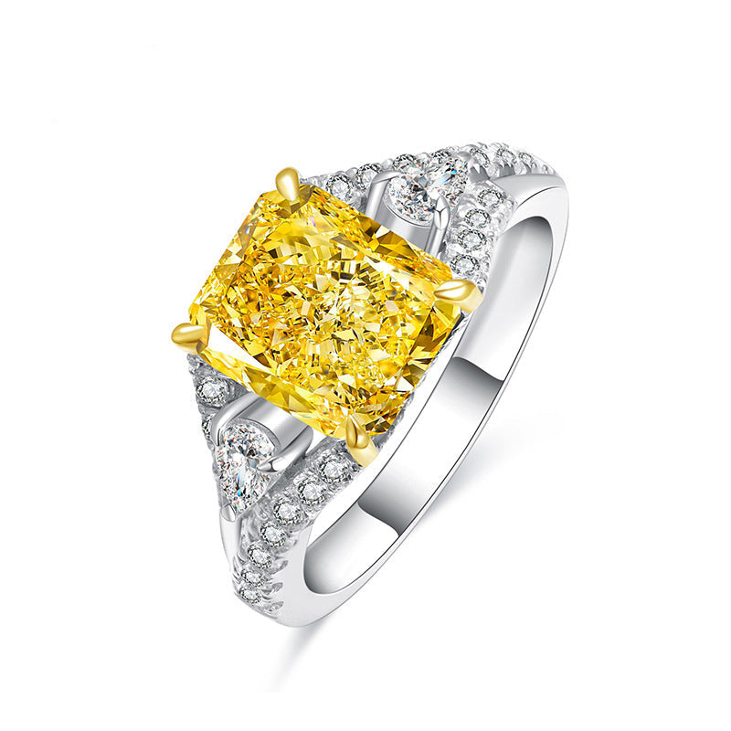 Lovely yellow citrine ring set in 925 sterling silver with white sapphire accents, showcasing its vibrant color and elegant design.