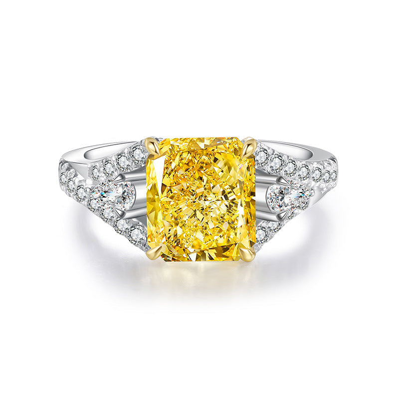 Lovely yellow citrine ring set in 925 sterling silver with white sapphire accents, showcasing its vibrant color and elegant design.