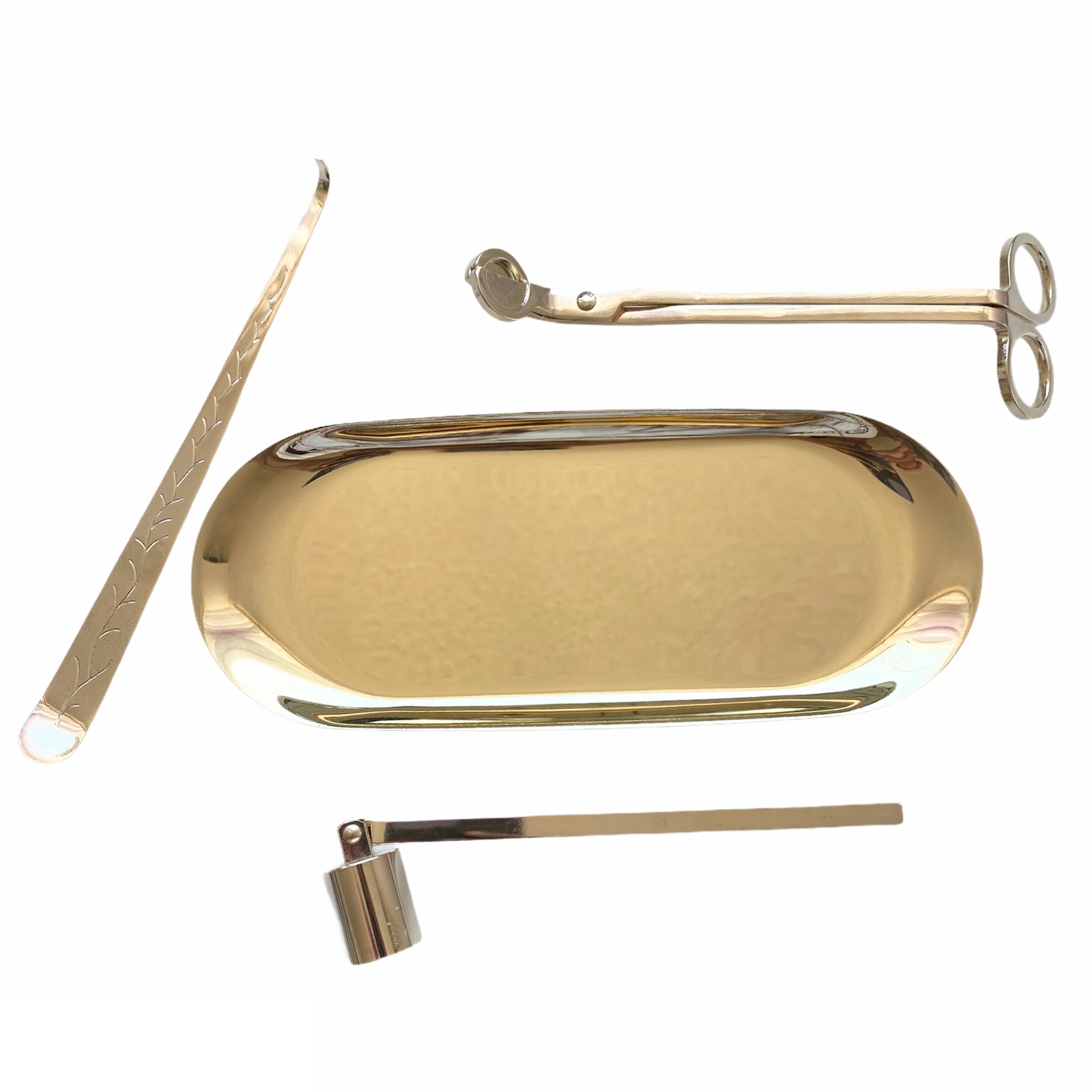 Luxury Candle Maintenance Kit featuring a wick trimmer, snuffer, wick dipper, and tray in gold and silver finishes.