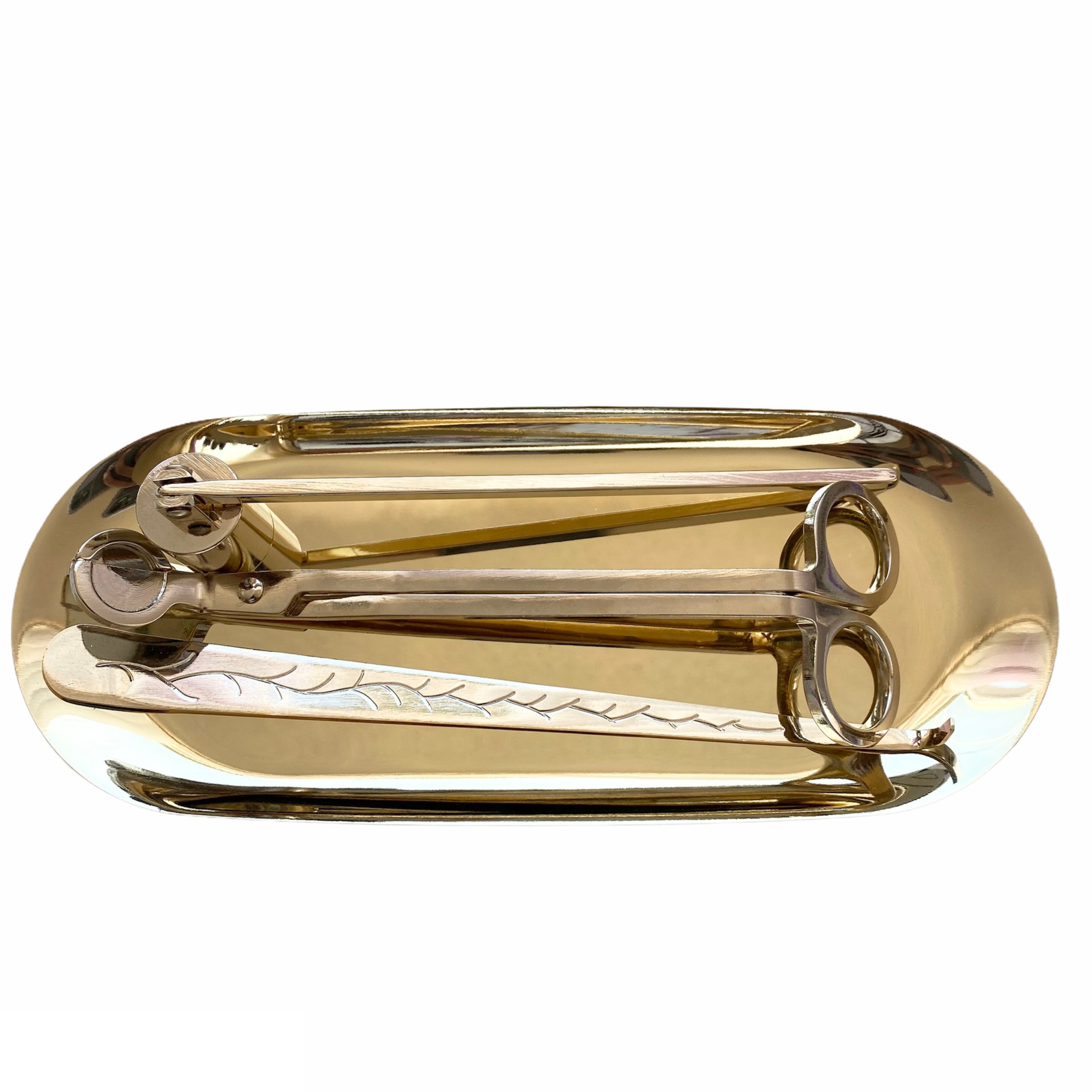 Luxury Candle Maintenance Kit featuring a wick trimmer, snuffer, wick dipper, and tray in gold and silver finishes.