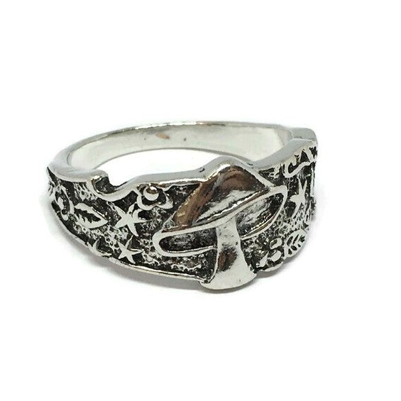 A stylish Magic Mushroom Psychedelic Ring made of sterling silver plated steel alloy, featuring a whimsical mushroom design, perfect for festivals.