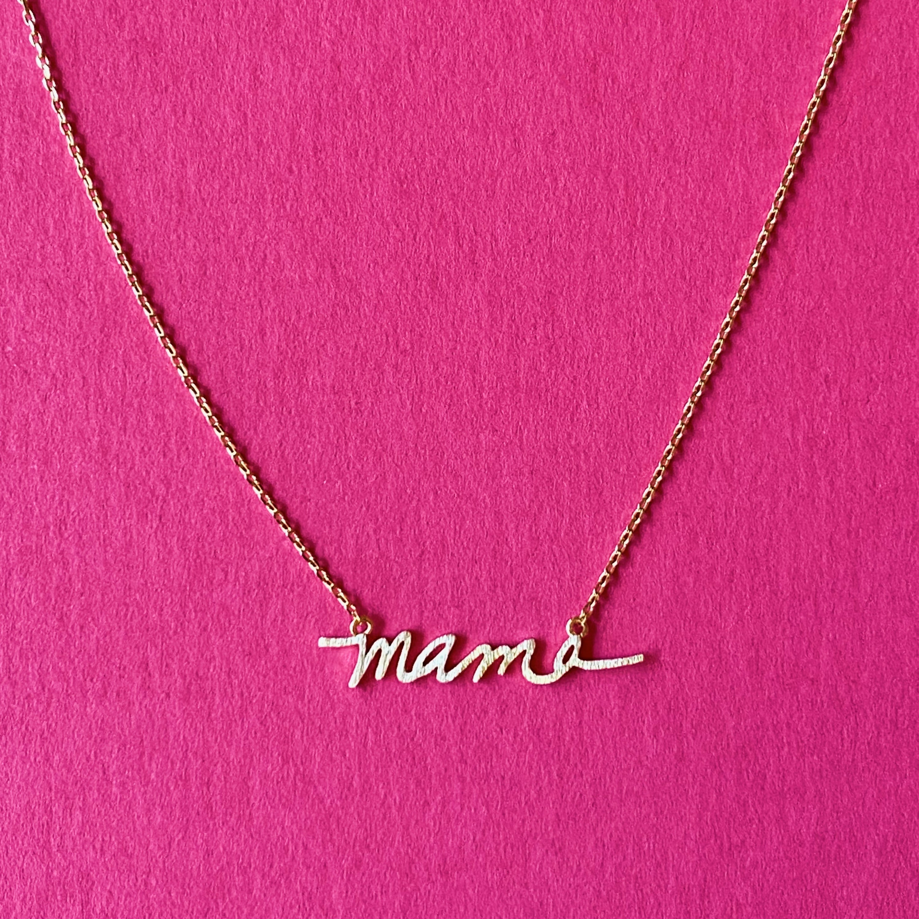 Mama Script Necklace featuring the word 'mama' in elegant script font on a gold chain.