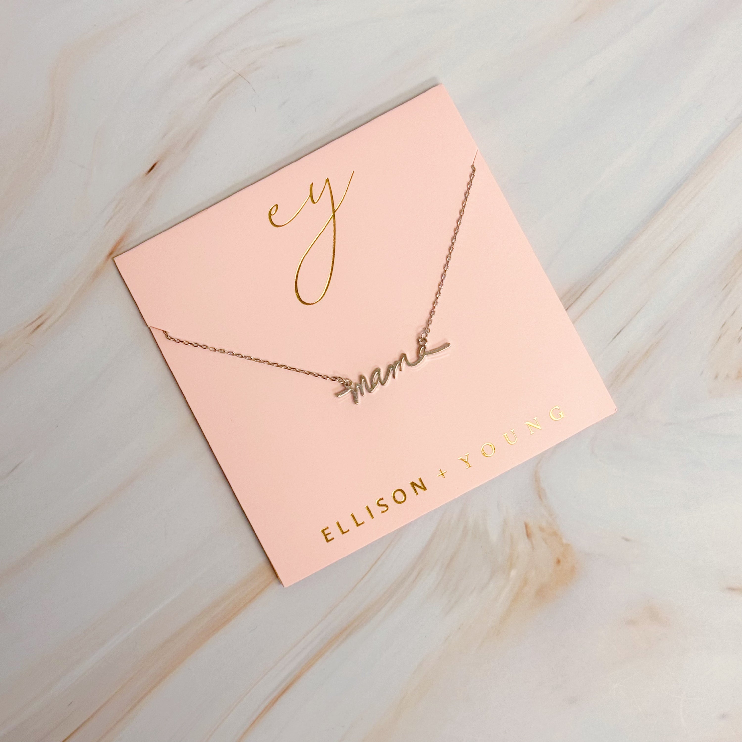 Mama Script Necklace featuring the word 'mama' in elegant script font on a gold chain.