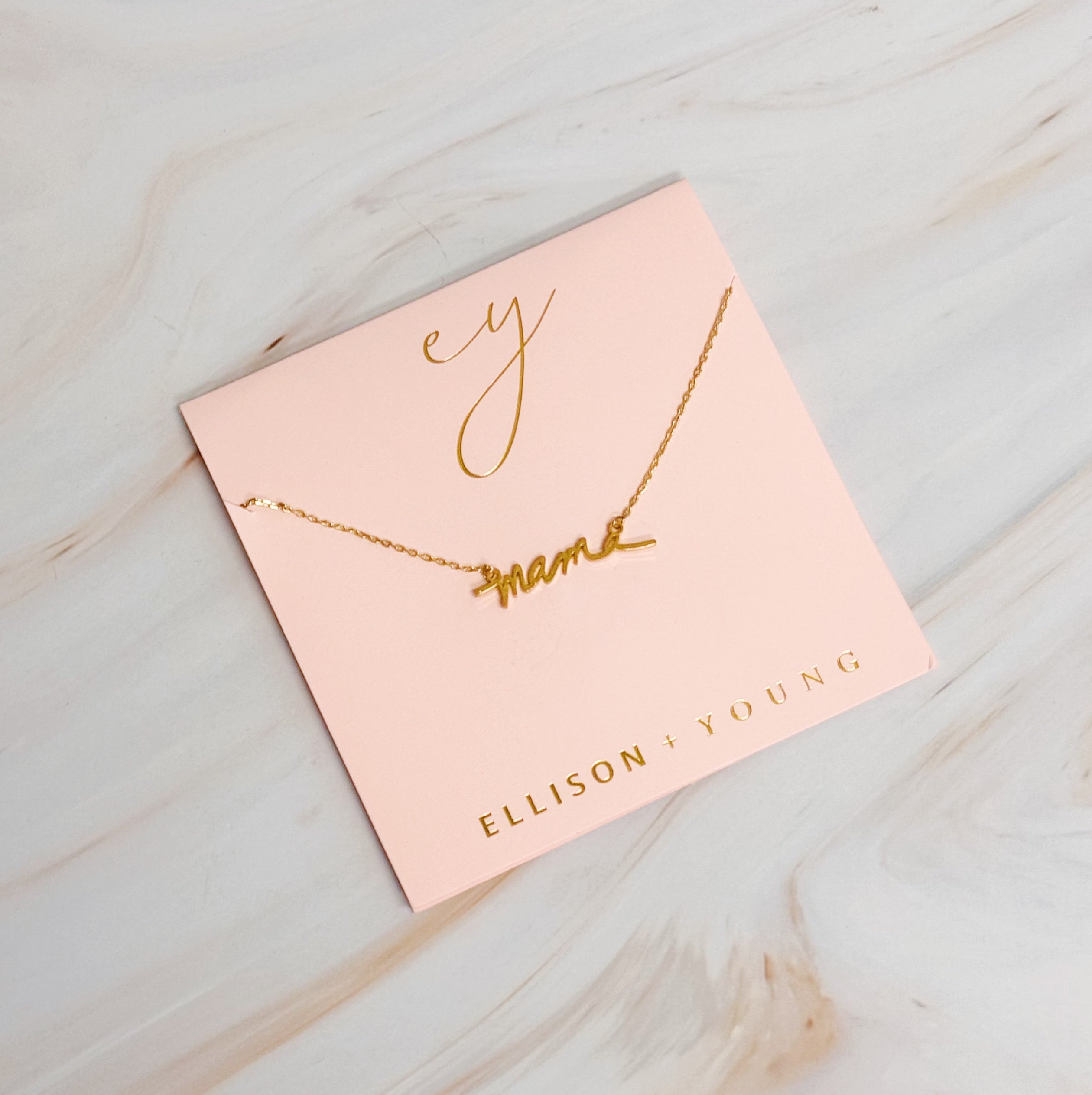 Mama Script Necklace featuring the word 'mama' in elegant script font on a gold chain.