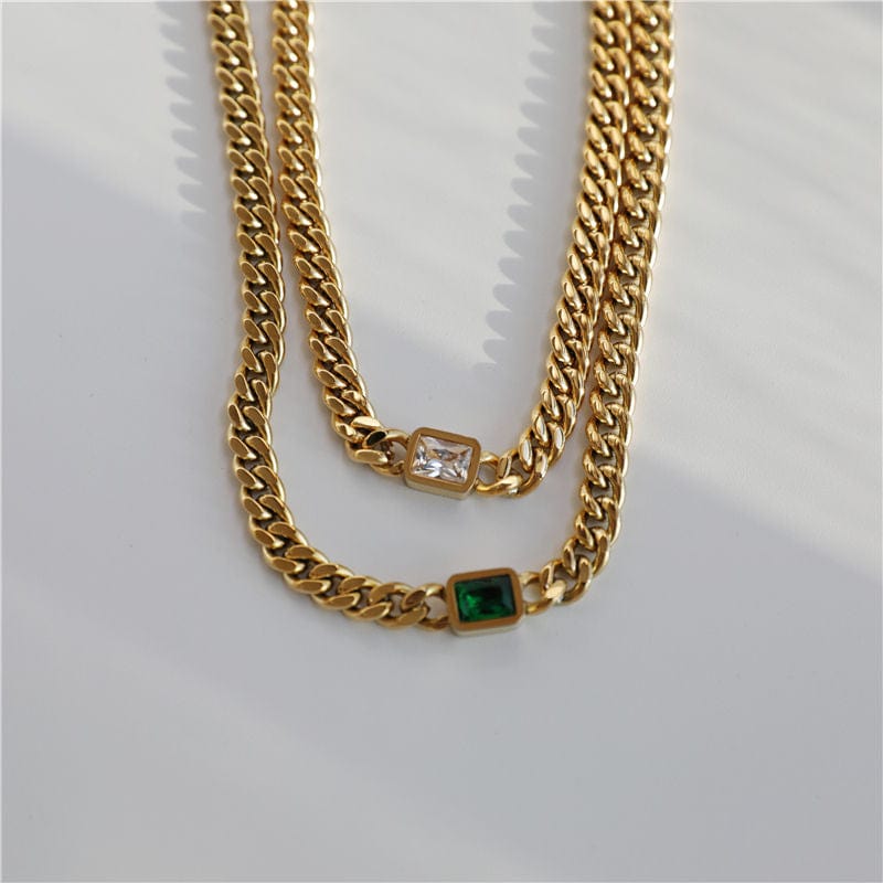 Martha Cuban Link Chain 8mm in rich gold with diamond cut emerald and clear CZ crystals, showcasing its chunky design and adjustable length.