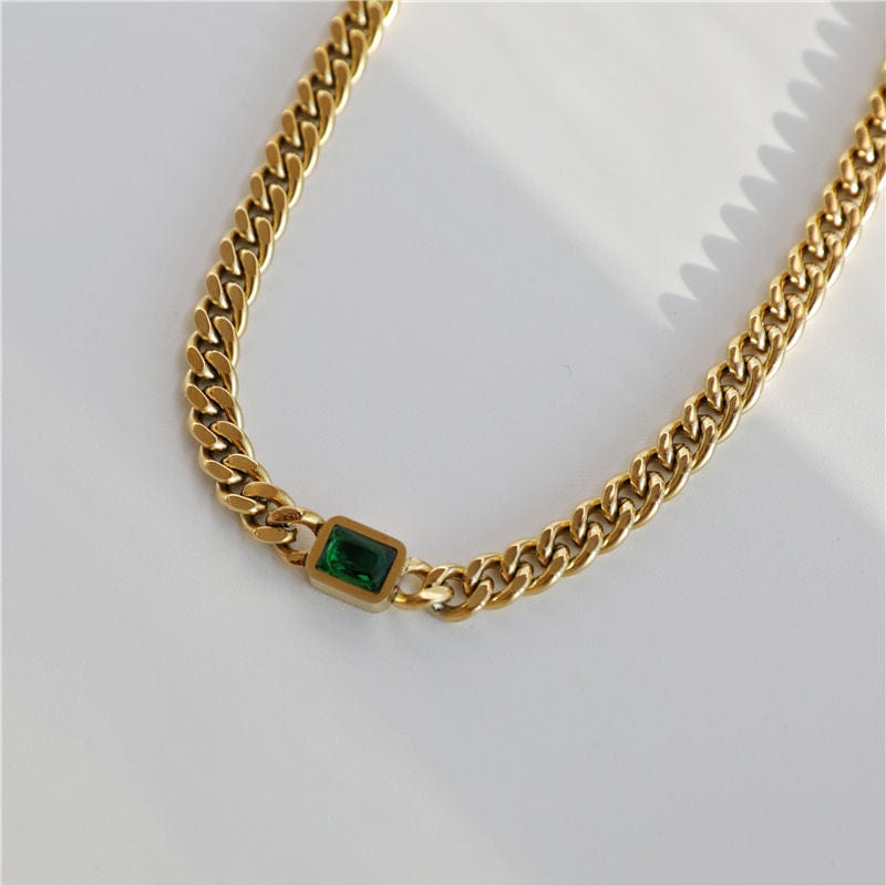 Martha Cuban Link Chain 8mm in rich gold with diamond cut emerald and clear CZ crystals, showcasing its chunky design and adjustable length.