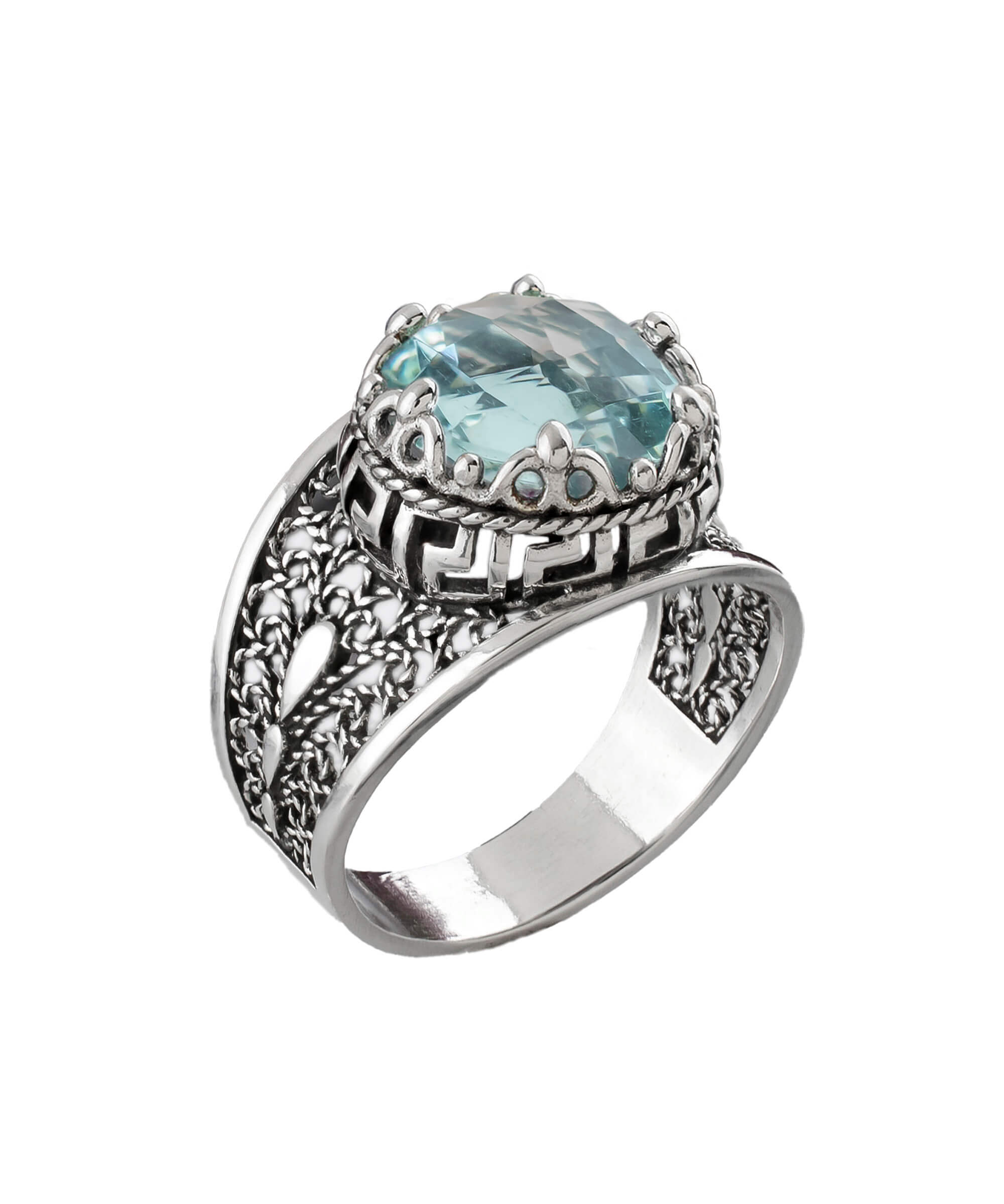 Elegant silver cocktail ring featuring aquamarine gemstone and intricate filigree art design, perfect for women.