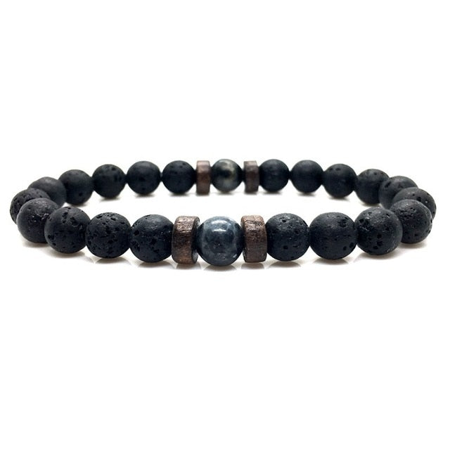 Men's bracelet featuring natural moonstone beads, Tibetan Buddha design, and lava stone accents, perfect for chakra healing.