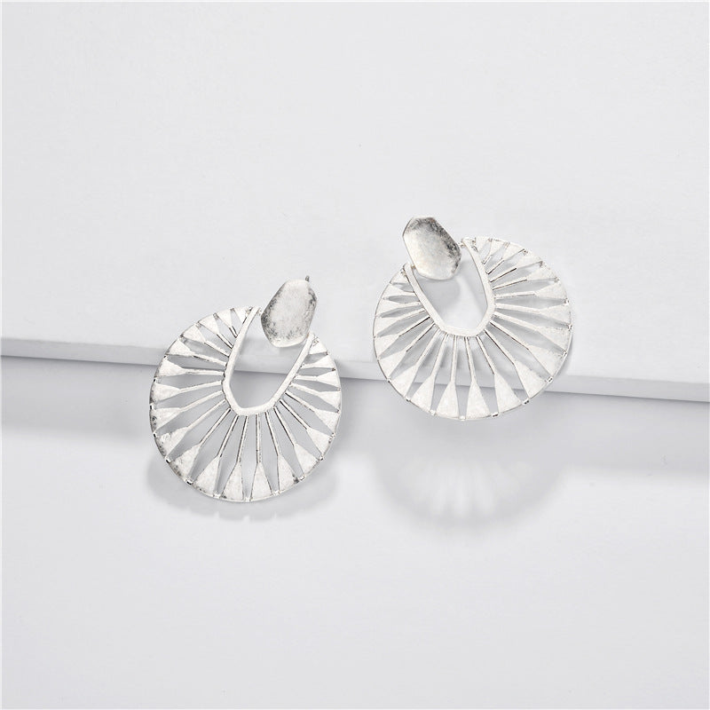 A pair of elegant Metal Post Drop Earrings by DOBBI, showcasing a vibrant color selection and stylish drop design.