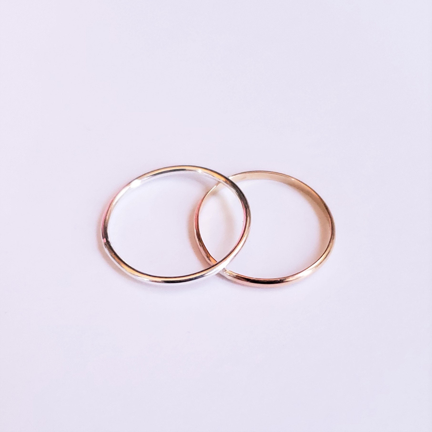 Mia 2 mm Fitted Toe Ring in sterling silver and 14K gold fill, showcasing its delicate design and versatility.