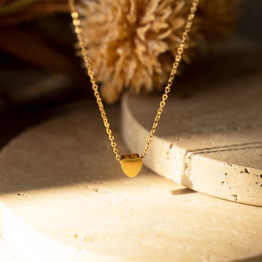 MINI Heart Necklace featuring a delicate heart pendant on a 14k gold plated stainless steel chain.