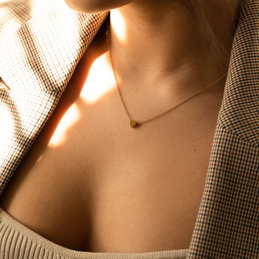 MINI Heart Necklace featuring a delicate heart pendant on a 14k gold plated stainless steel chain.