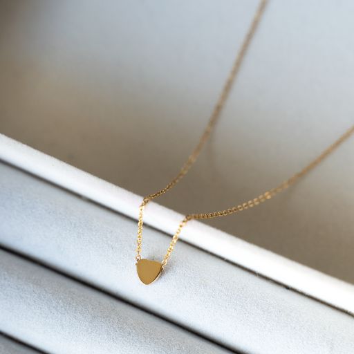 MINI Heart Necklace featuring a delicate heart pendant on a 14k gold plated stainless steel chain.