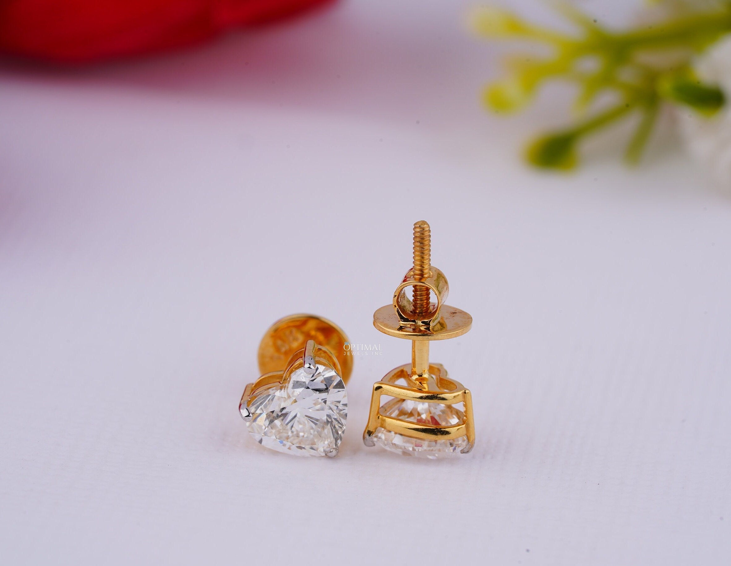 Minimalist heart shape diamond earrings featuring 1 Ctw heart cut lab-grown diamonds set in yellow gold, perfect for anniversaries.