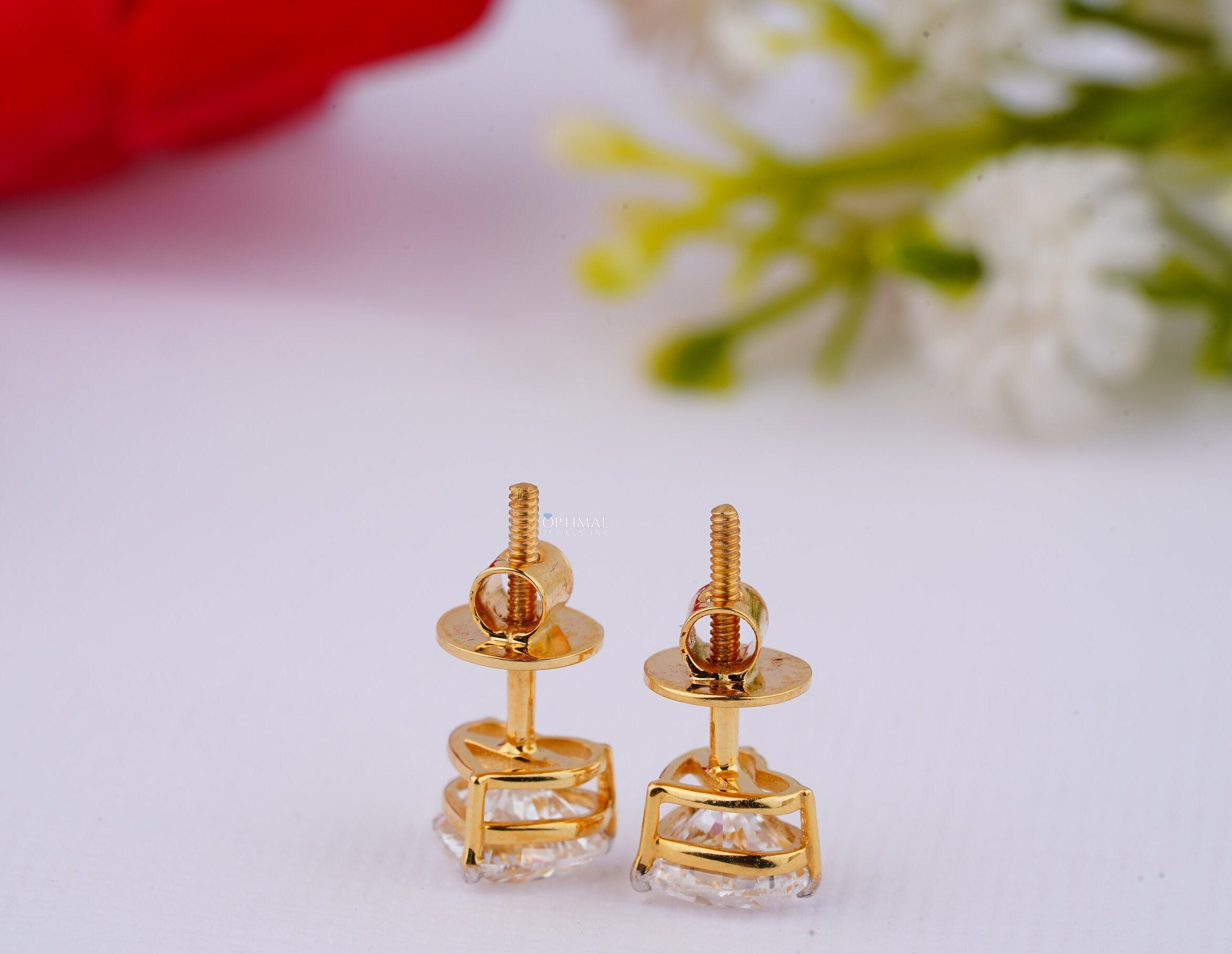 Minimalist heart shape diamond earrings featuring 1 Ctw heart cut lab-grown diamonds set in yellow gold, perfect for anniversaries.