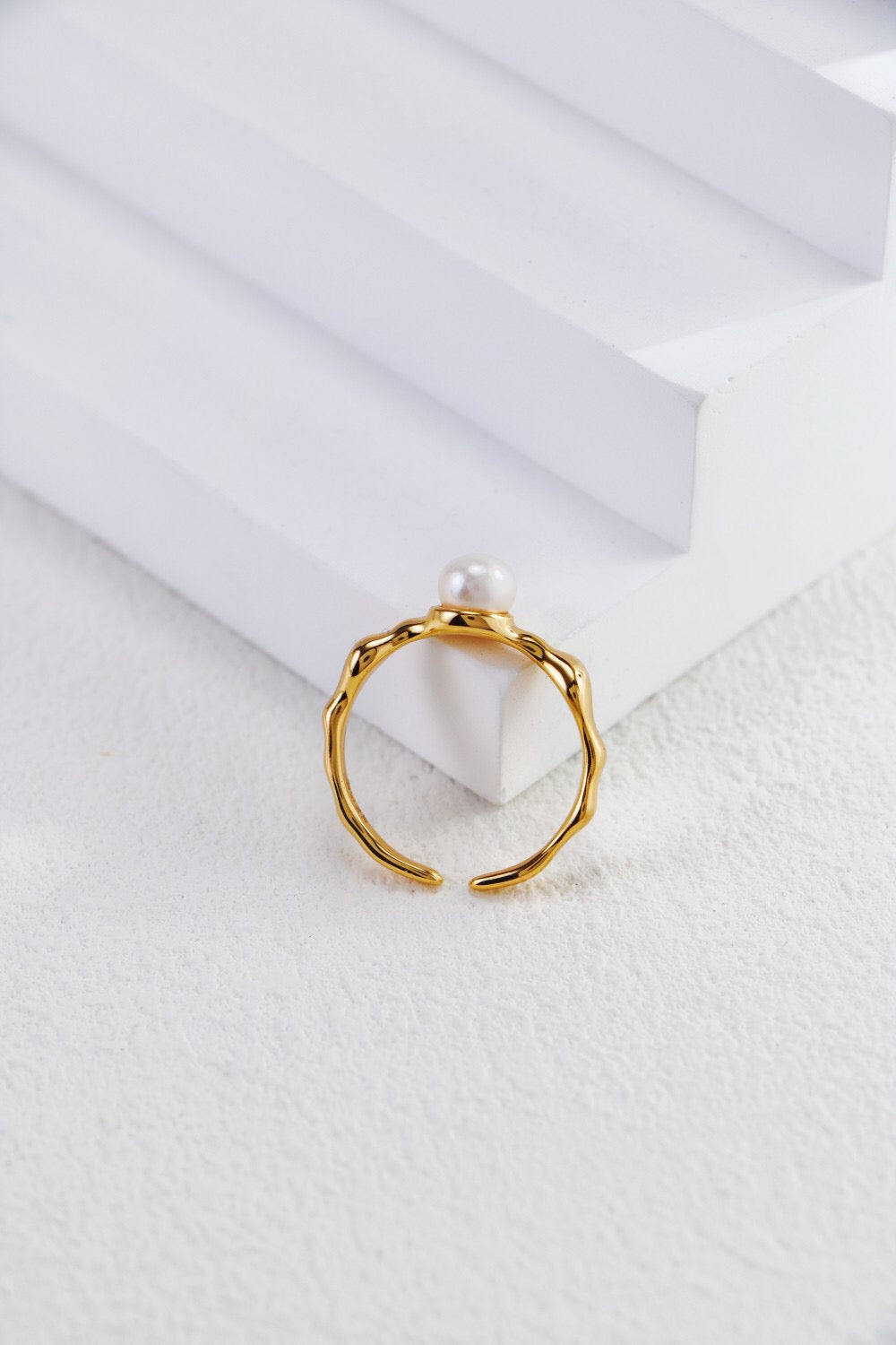 Minimalist Pearl Open Ring featuring a genuine freshwater pearl set in sterling silver or gold vermeil, showcasing a sleek and elegant design.