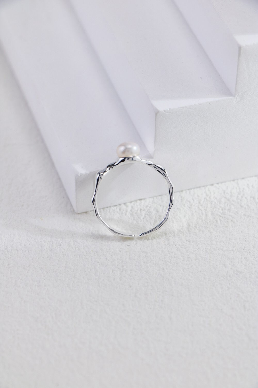 Minimalist Pearl Open Ring featuring a genuine freshwater pearl set in sterling silver or gold vermeil, showcasing a sleek and elegant design.