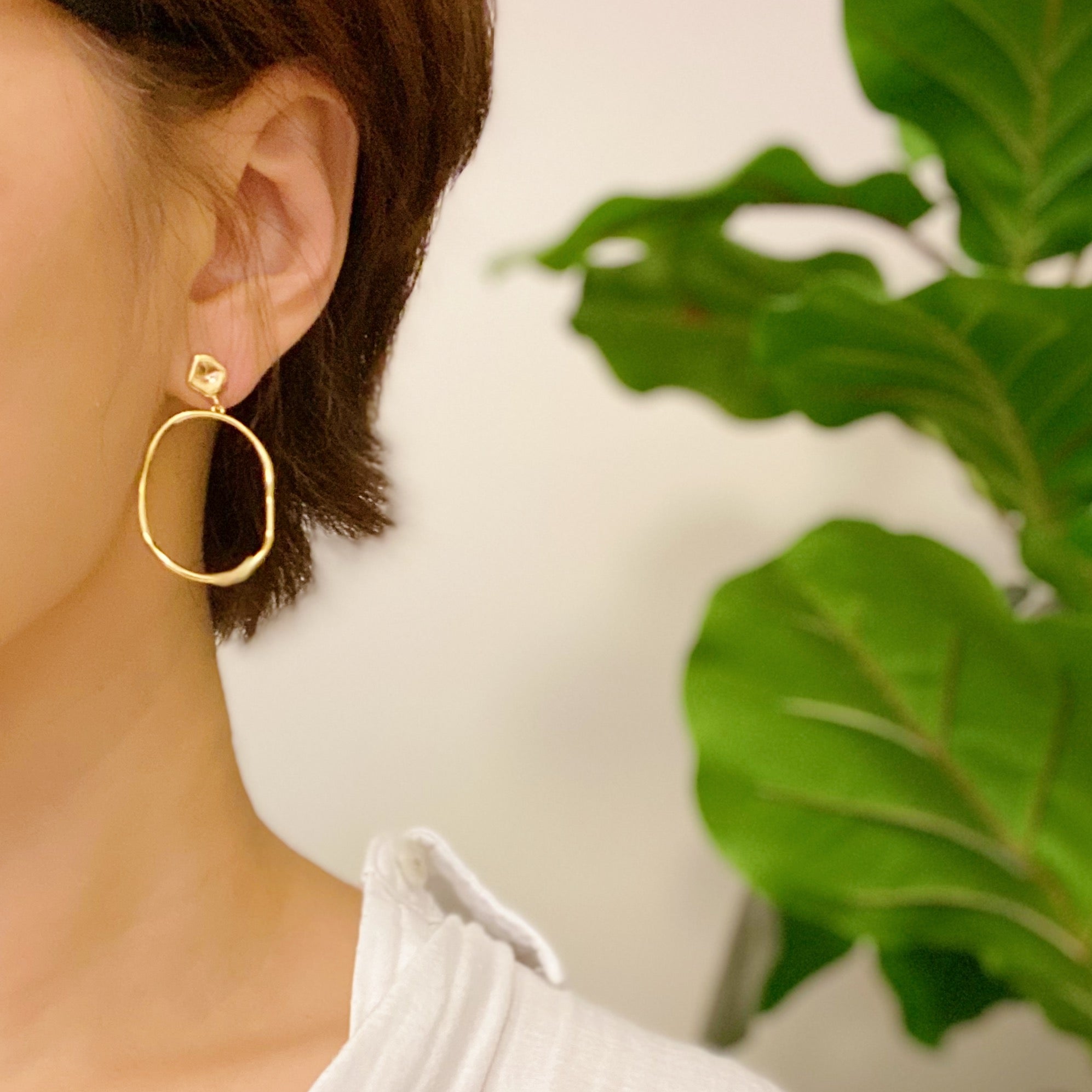 Stylish Modern Molten Oval Drop Earrings in 18K gold plated brass, featuring a chic dangling design.